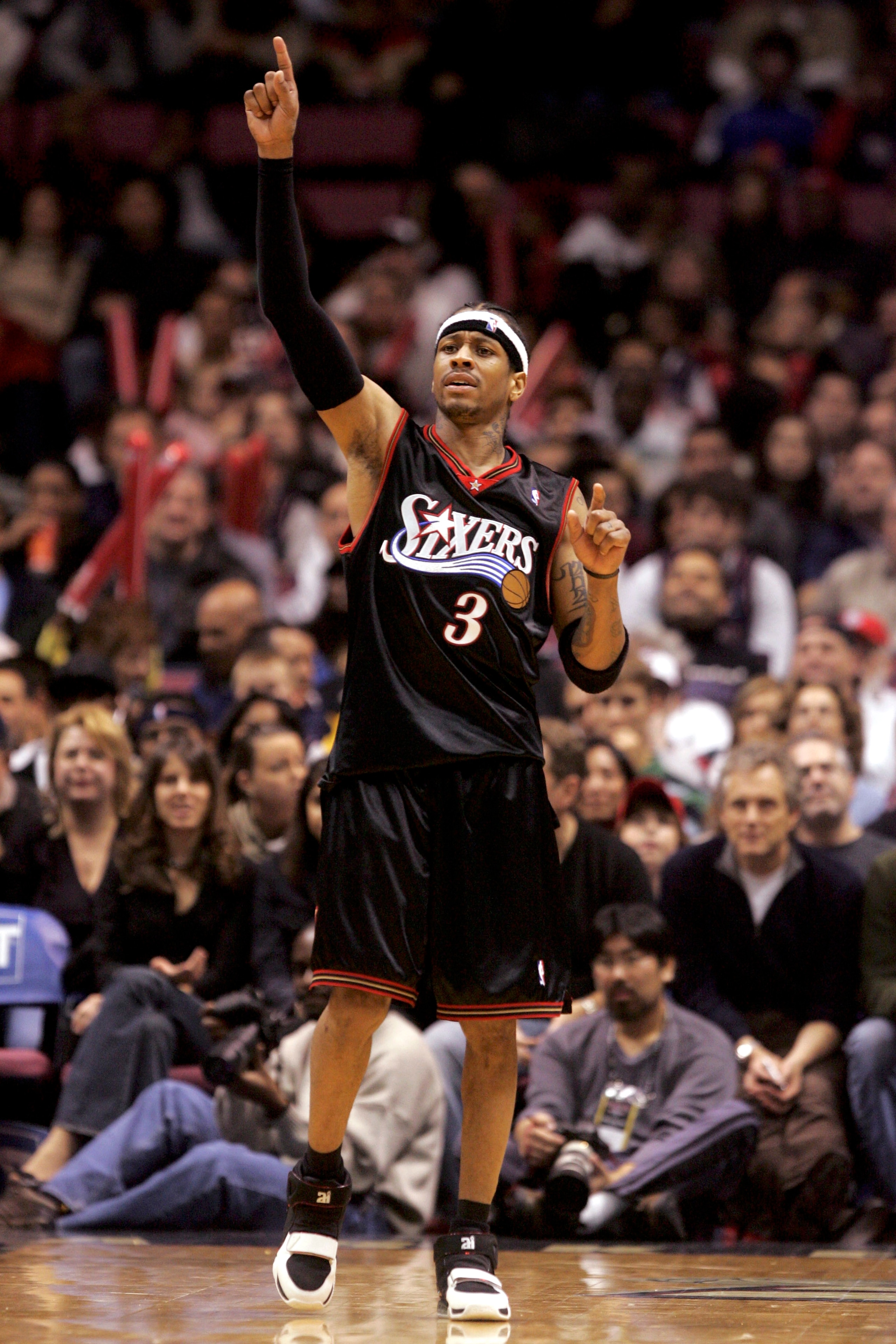 EAST RUTHERFORD, NJ - DECEMBER 10:  Allen Iverson #3 of the Philadelphia 76ers reacts to a basket scored against the New Jersey Nets during their game at Continental Airlines Arena on December 10, 2005 in East Rutherford, New Jersey. The Sixers defeated t