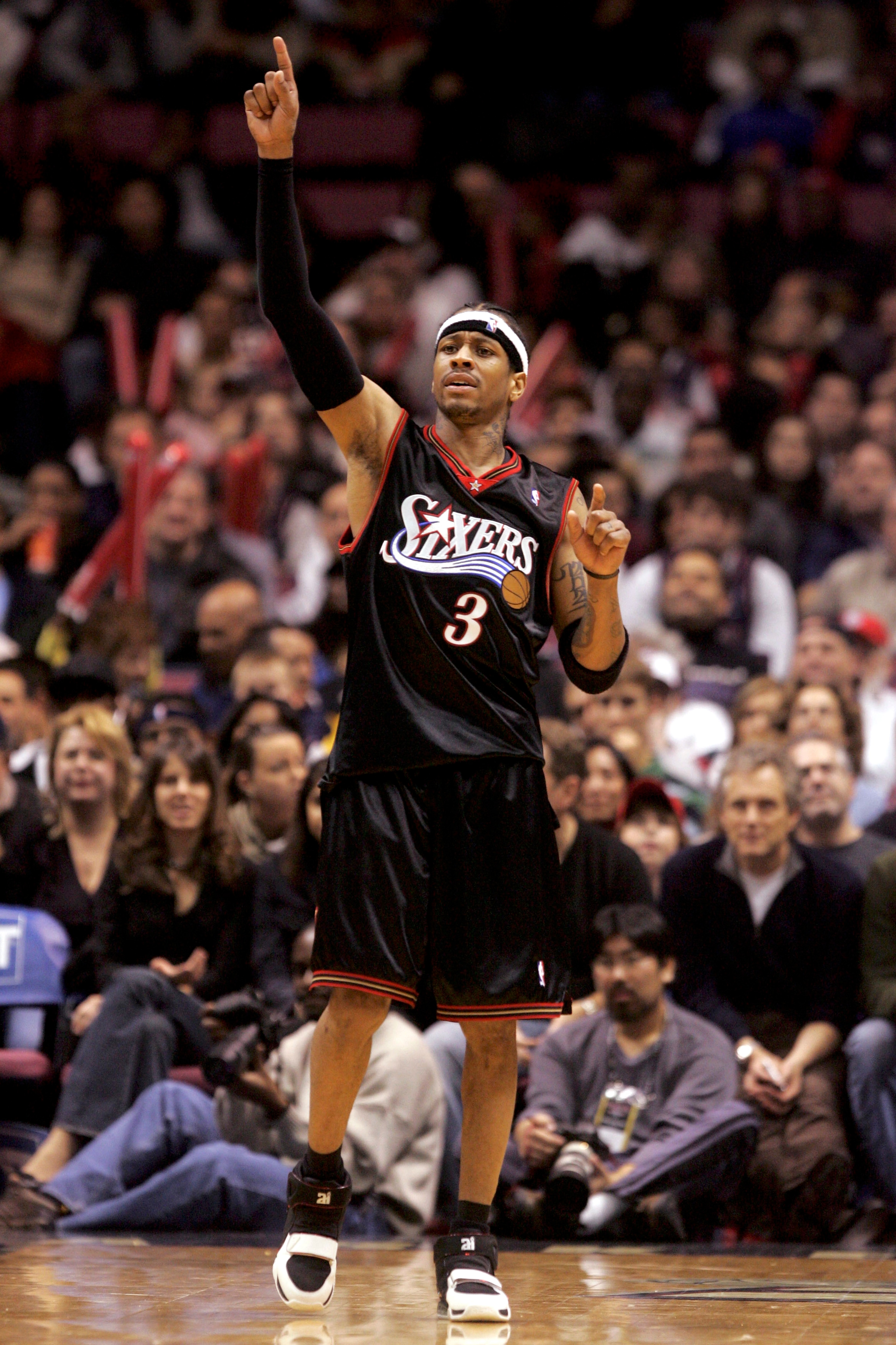 EAST RUTHERFORD, NJ - DECEMBER 10:  Allen Iverson #3 of the Philadelphia 76ers reacts to a basket scored against the New Jersey Nets during their game at Continental Airlines Arena on December 10, 2005 in East Rutherford, New Jersey. The Sixers defeated t