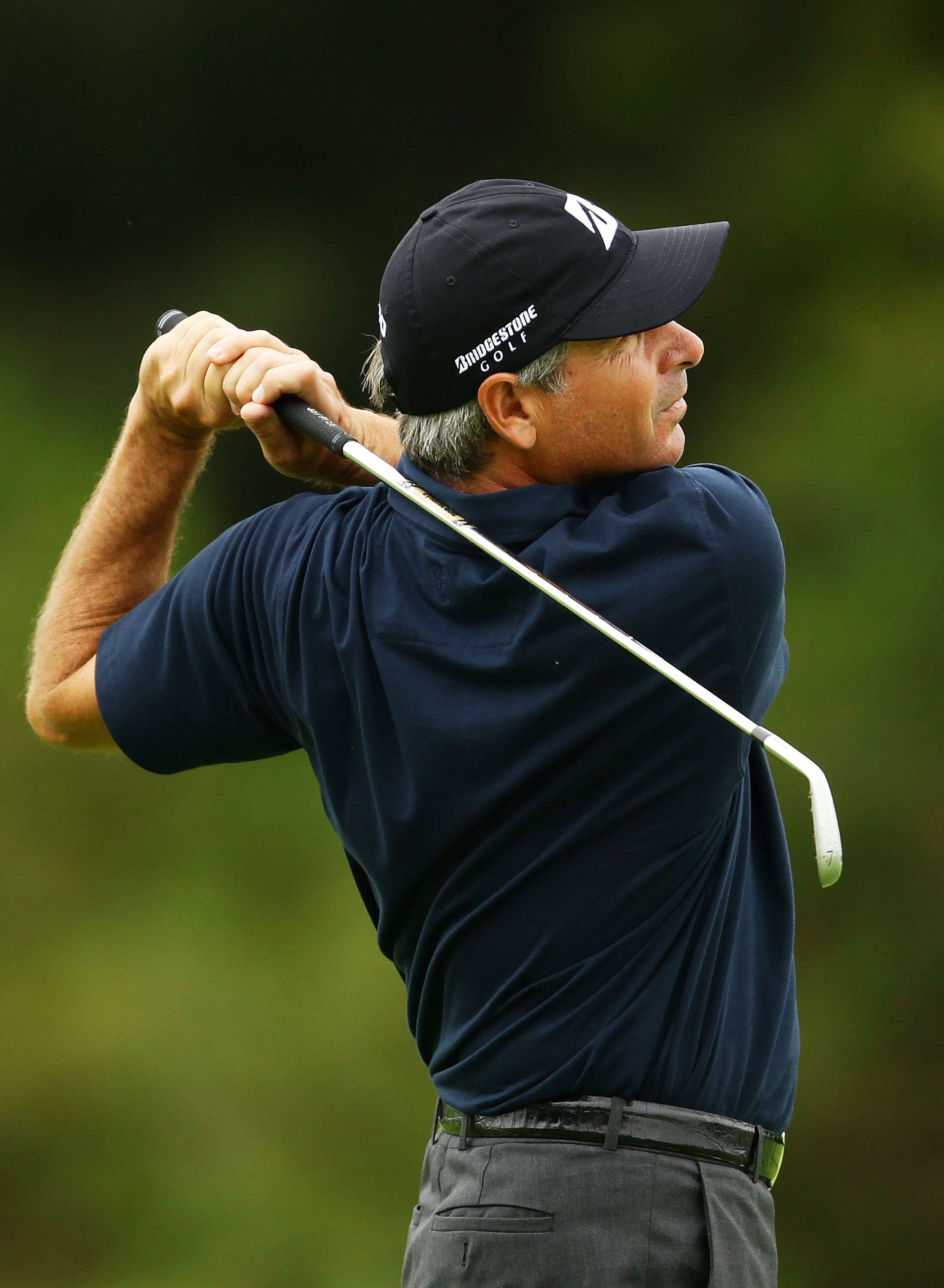 SYDNEY, AUSTRALIA - DECEMBER 02:  Fred Couples of the USA plays a fairway shot during day one of the Australian Open at The Lakes Golf Club on December 2, 2010 in Sydney, Australia.  (Photo by Matt King/Getty Images)