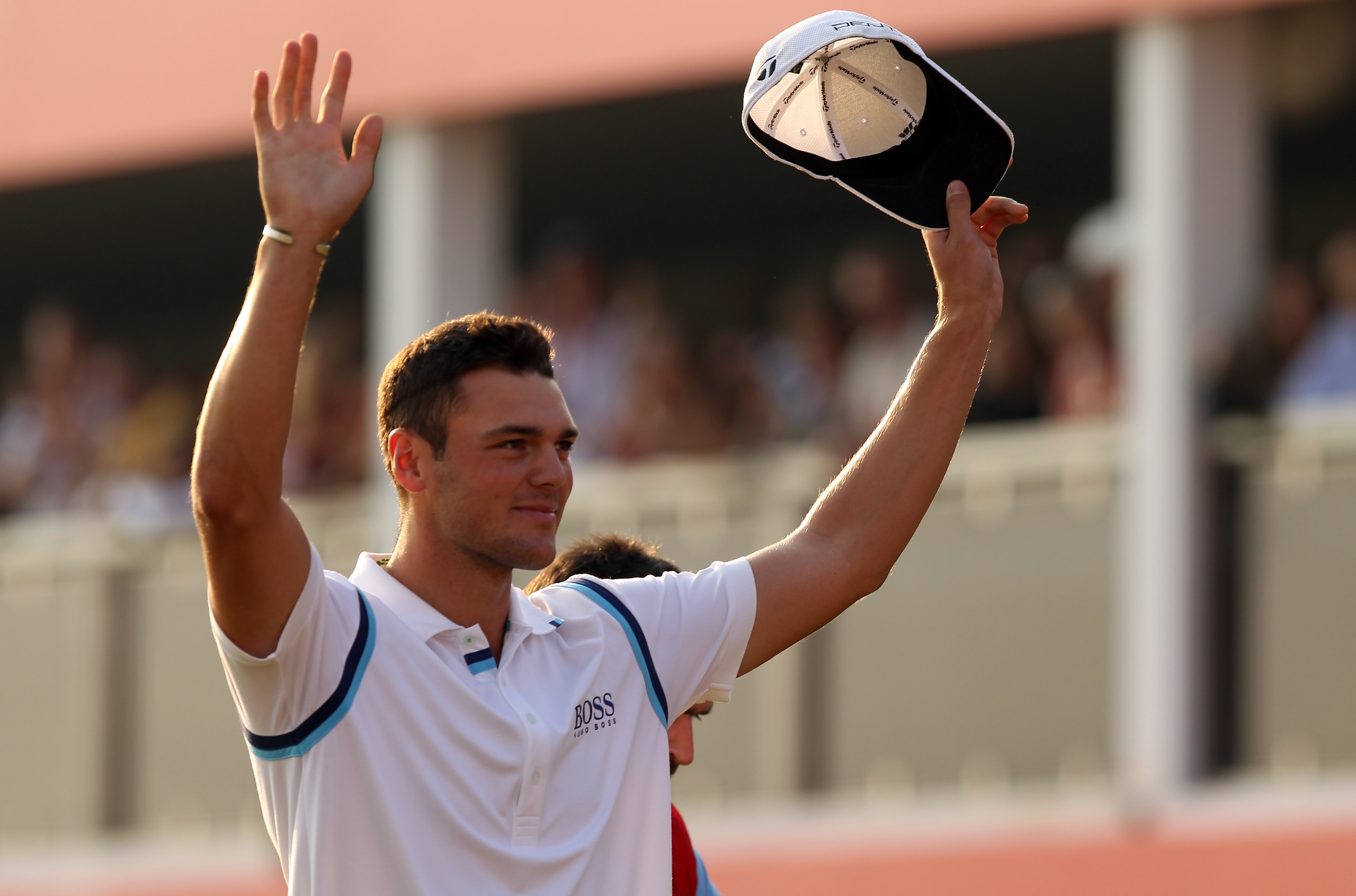 ABU DHABI, UNITED ARAB EMIRATES - JANUARY 23:  Martin Kaymer of Germany celebrates on the 18th green after winning the Abu Dhabi HSBC Golf Championship at the Abu Dhabi Golf Club on January 23, 2011 in Abu Dhabi, United Arab Emirates.  (Photo by Ross Kinn