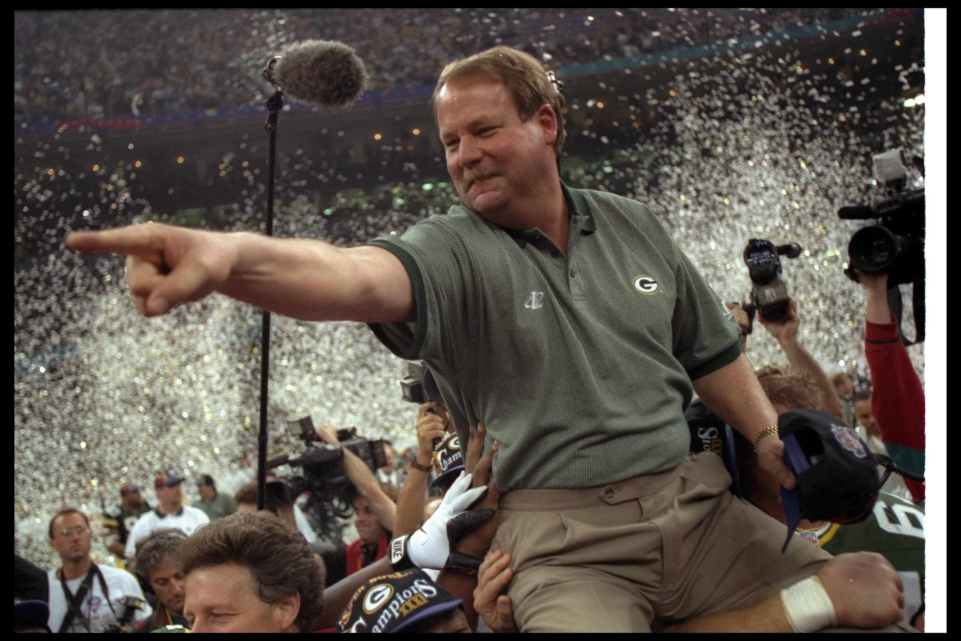 26 Jan 1997:  Green Bay Packers head coach Mike Holmgren celebrates after Super Bowl XXXI against the New England Patriots at the Superdome in New Orleans, Louisiana.  The Packers won the game, 35-21. Mandatory Credit: Rick Stewart  /Allsport