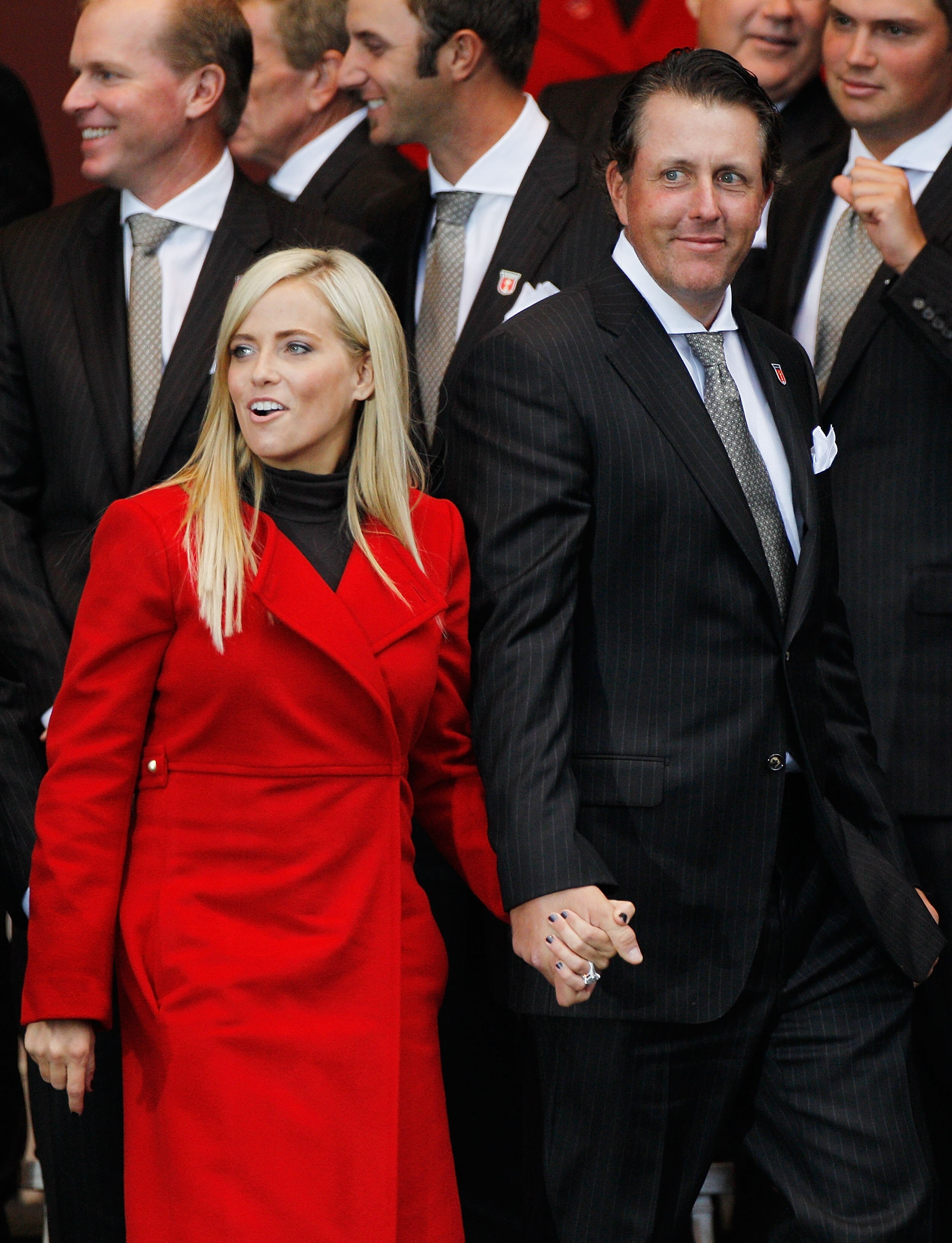 NEWPORT, WALES - SEPTEMBER 30:  Amy and Phil Mickelson walk together during the Opening Ceremony prior to the 2010 Ryder Cup at the Celtic Manor Resort on September 30, 2010 in Newport, Wales.  (Photo by Sam Greenwood/Getty Images)