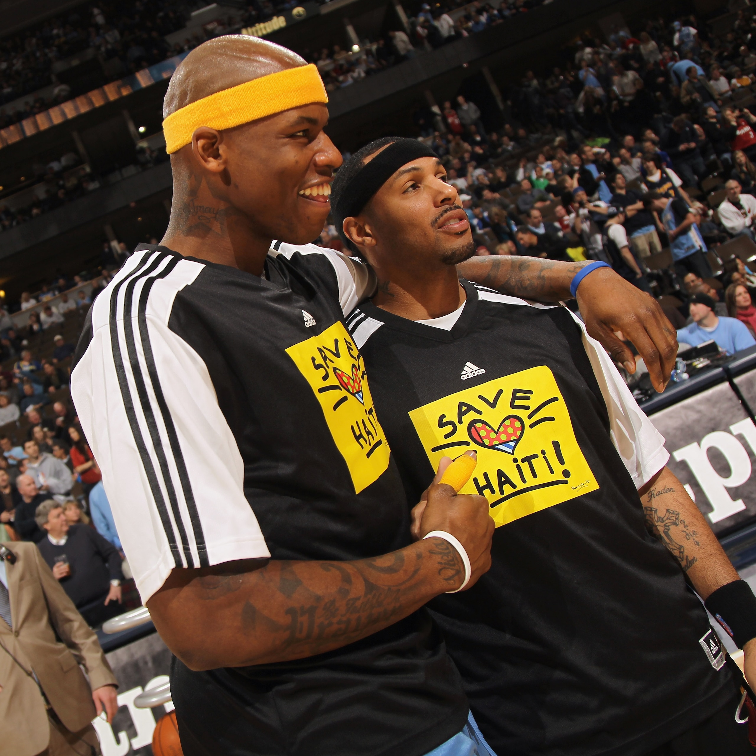 DENVER, CO - JANUARY 13: (L-R) Al Harrington #7 of the Denver Nuggets and Eddie House #55 of the Miami Heat show off their shirts as the teams warmed up in 'Save Haiti' shirts to promote the Haiti Relief Fund at the Pepsi Center on January 13, 2011 in De DENVER, CO - JANUARY 13: (L-R) Al Harrington #7 of the Denver Nuggets and Eddie House #55 of the Miami Heat show off their shirts as the teams warmed up in 'Save Haiti' shirts to promote the Haiti Relief Fund at the Pepsi Center on January 13, 2011 in De