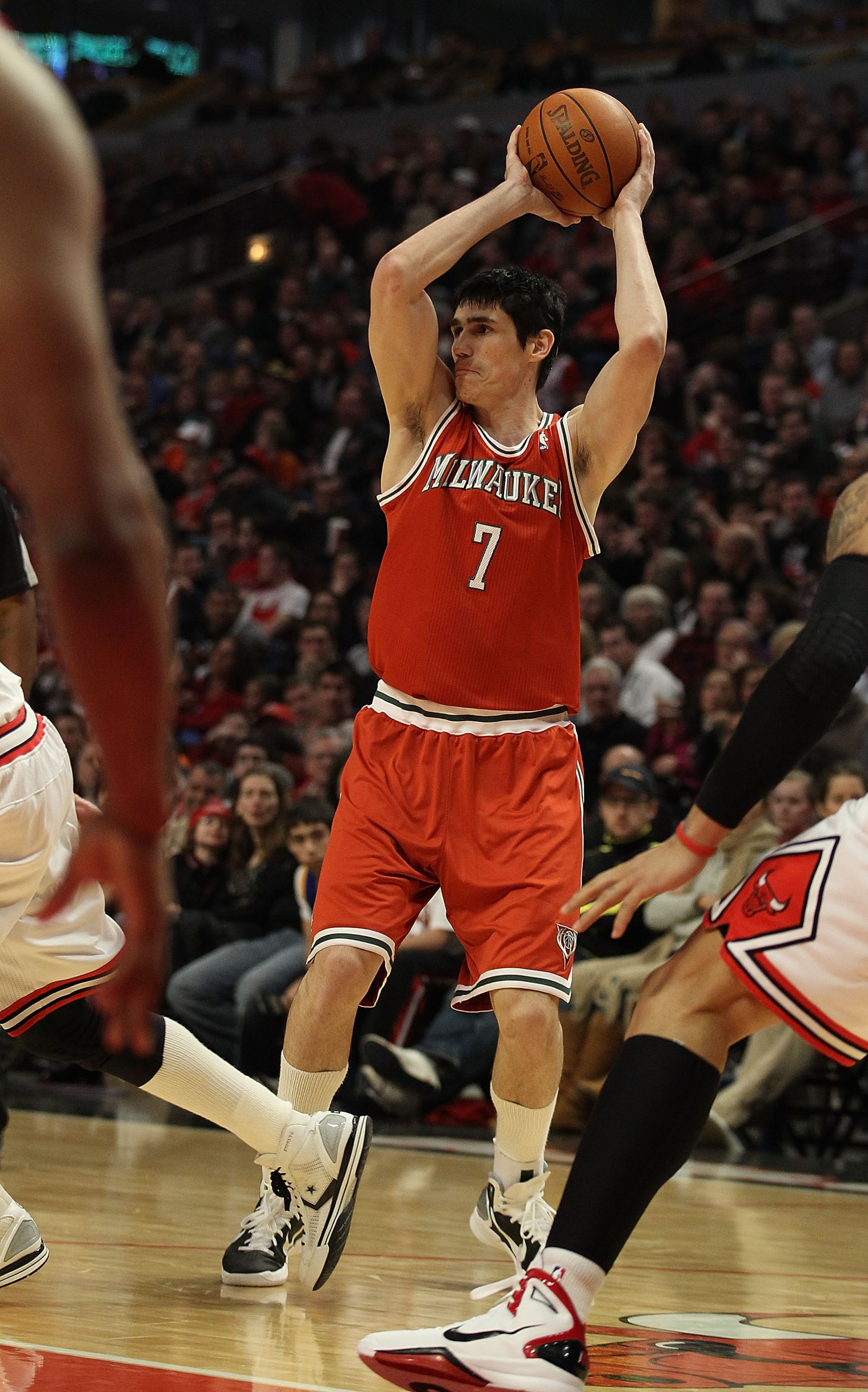 CHICAGO, IL - DECEMBER 28: Ersan Ilyasova #7 of the Milwaukee Bucks looks to pass against the Chicago Bulls at the United Center on December 28, 2010 in Chicago, Illinois. The Bulls defeated the Bucks 90-77. NOTE TO USER: User expressly acknowledges and a CHICAGO, IL - DECEMBER 28: Ersan Ilyasova #7 of the Milwaukee Bucks looks to pass against the Chicago Bulls at the United Center on December 28, 2010 in Chicago, Illinois. The Bulls defeated the Bucks 90-77. NOTE TO USER: User expressly acknowledges and a