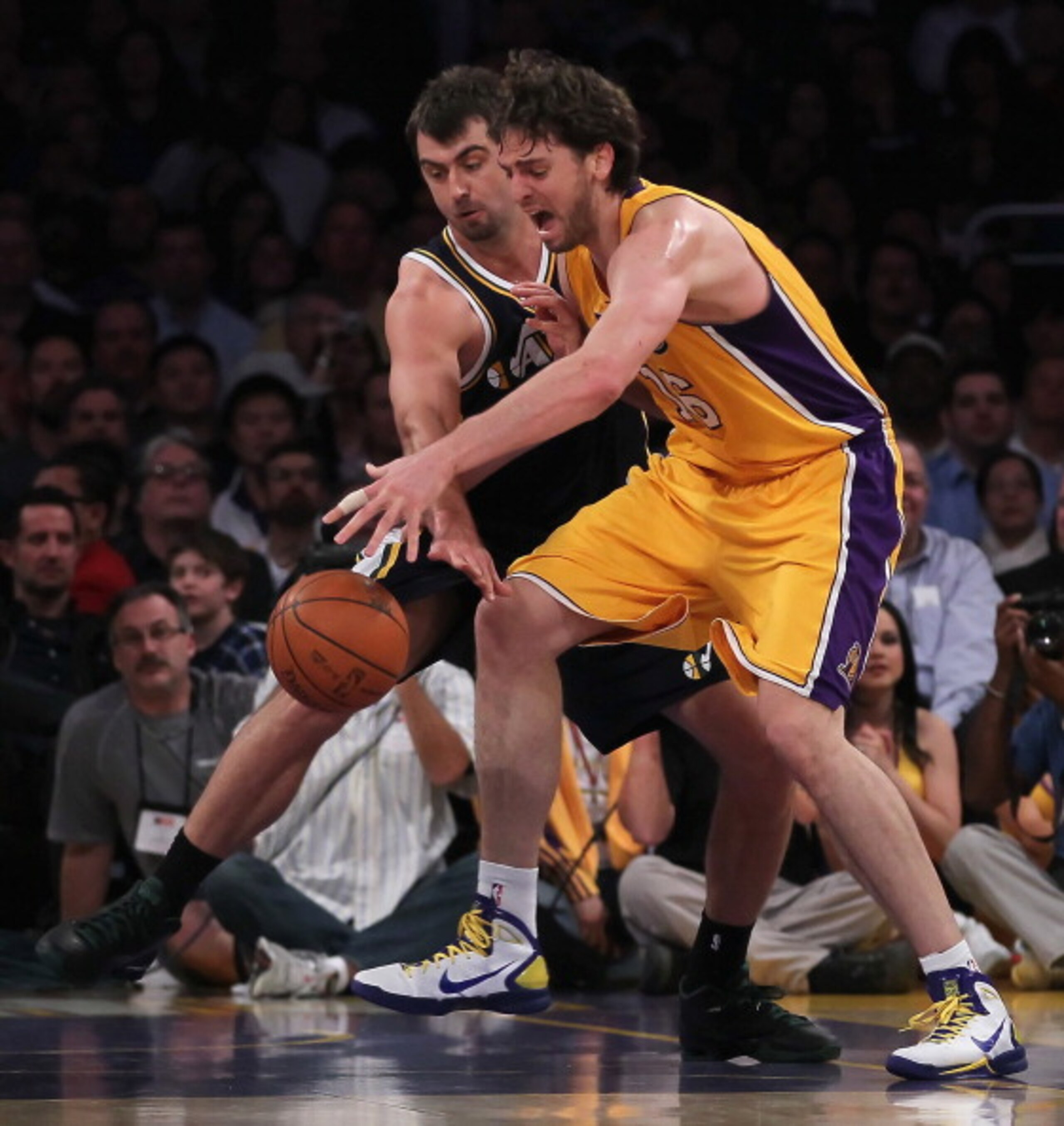 LOS ANGELES, CA - JANUARY 25: Mehmet Okur #13 of the Utah Jazz attempts to steal the ball from Pau Gasol #16 of the Los Angeles Lakers in the first half at Staples Center on January 25, 2011 in Los Angeles, California. The Lakers defeated the Jazz 120-91 LOS ANGELES, CA - JANUARY 25: Mehmet Okur #13 of the Utah Jazz attempts to steal the ball from Pau Gasol #16 of the Los Angeles Lakers in the first half at Staples Center on January 25, 2011 in Los Angeles, California. The Lakers defeated the Jazz 120-91