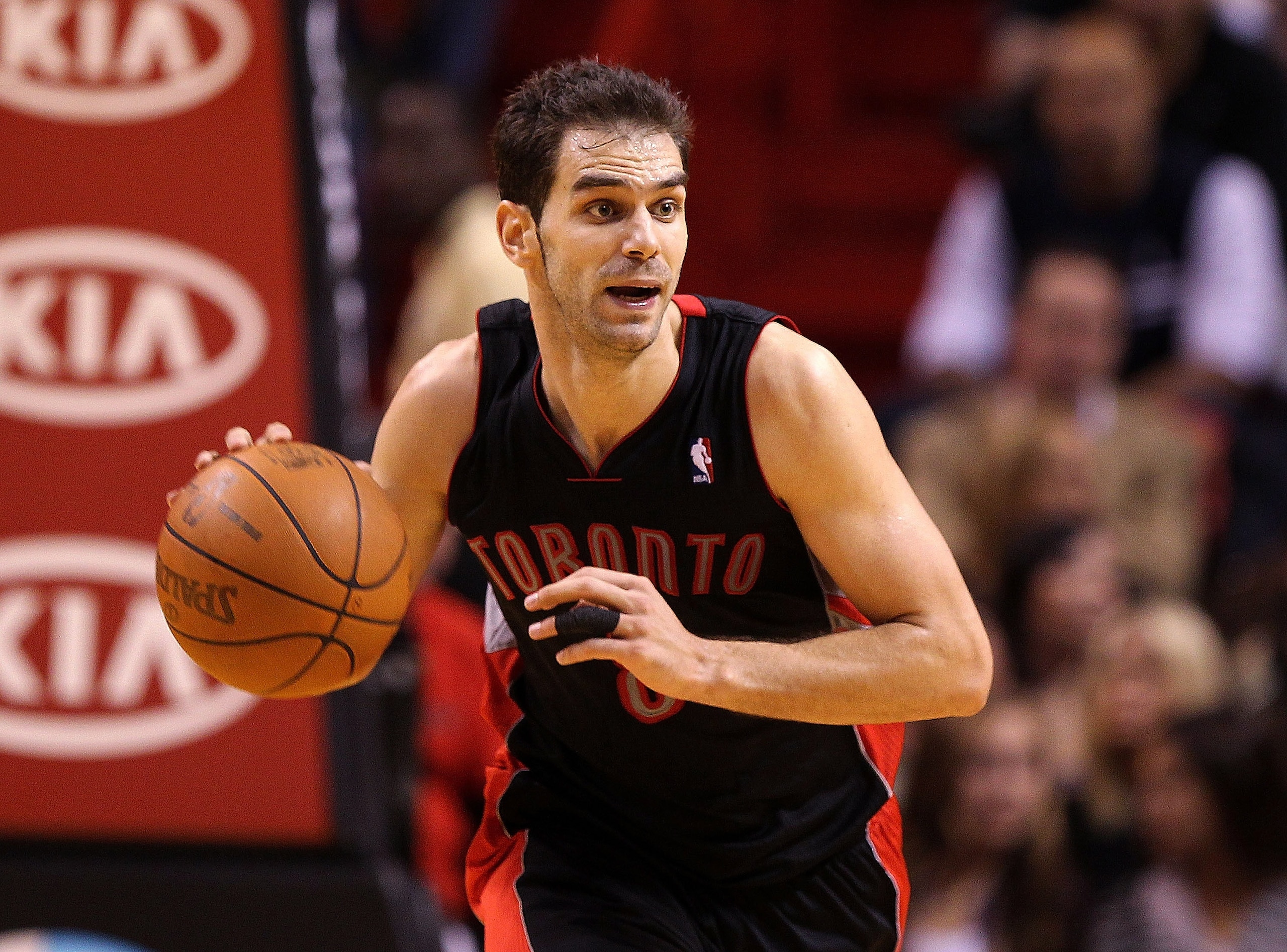 MIAMI, FL - JANUARY 22: Jose Calderon #8 of the Toronto Raptors dribbles the ball during a game against the Miami Heat at American Airlines Arena on January 22, 2011 in Miami, Florida. NOTE TO USER: User expressly acknowledges and agrees that, by downloa MIAMI, FL - JANUARY 22: Jose Calderon #8 of the Toronto Raptors dribbles the ball during a game against the Miami Heat at American Airlines Arena on January 22, 2011 in Miami, Florida. NOTE TO USER: User expressly acknowledges and agrees that, by downloa