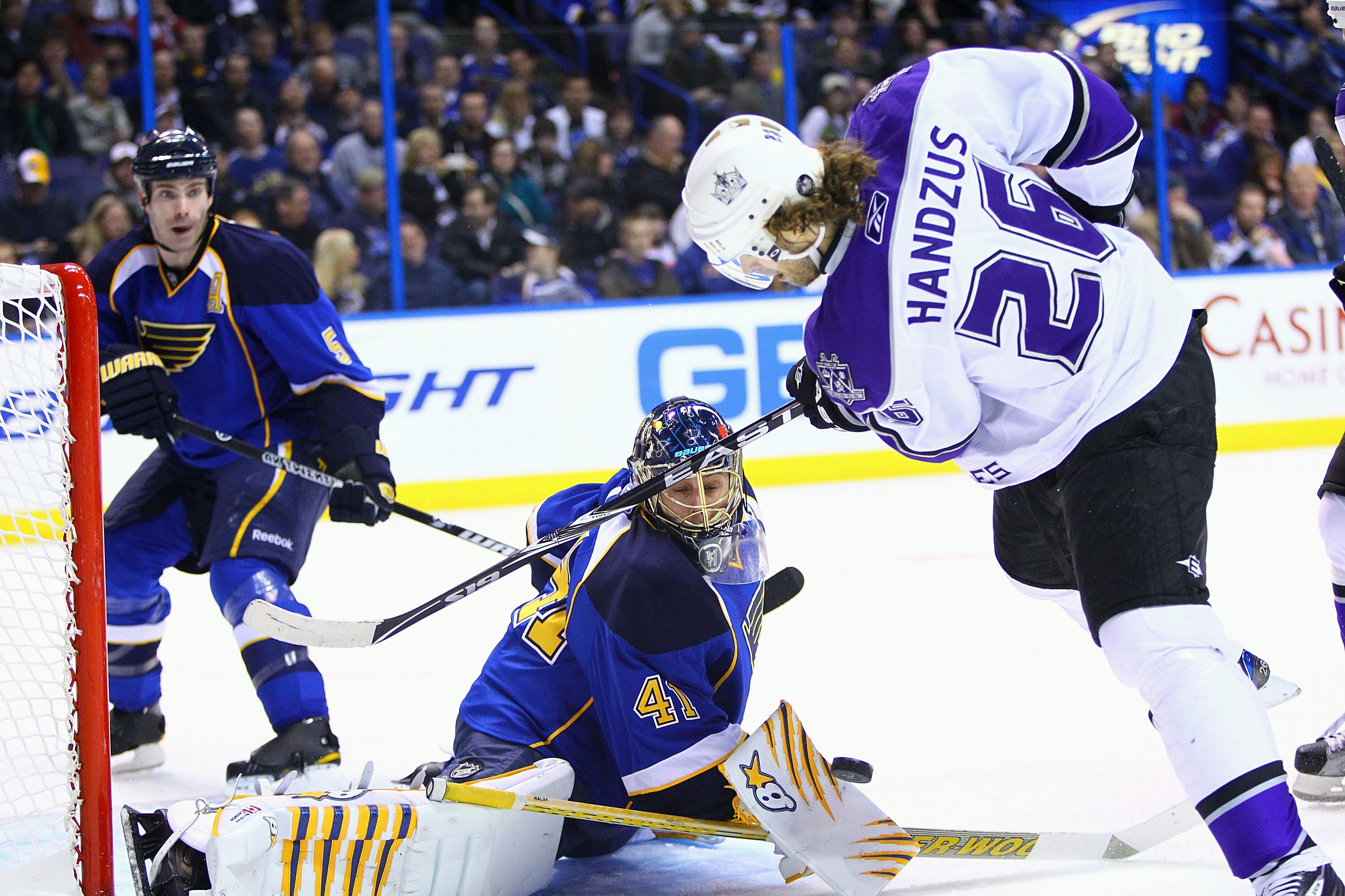 ST. LOUIS, MO - JANUARY 18: Jaroslav Halak #41 of the St. Louis Blues makes a save against Michal Handzus #26 of the Los Angeles Kings at the Scottrade Center on January 18, 2011 in St. Louis, Missouri.  (Photo by Dilip Vishwanat/Getty Images)
