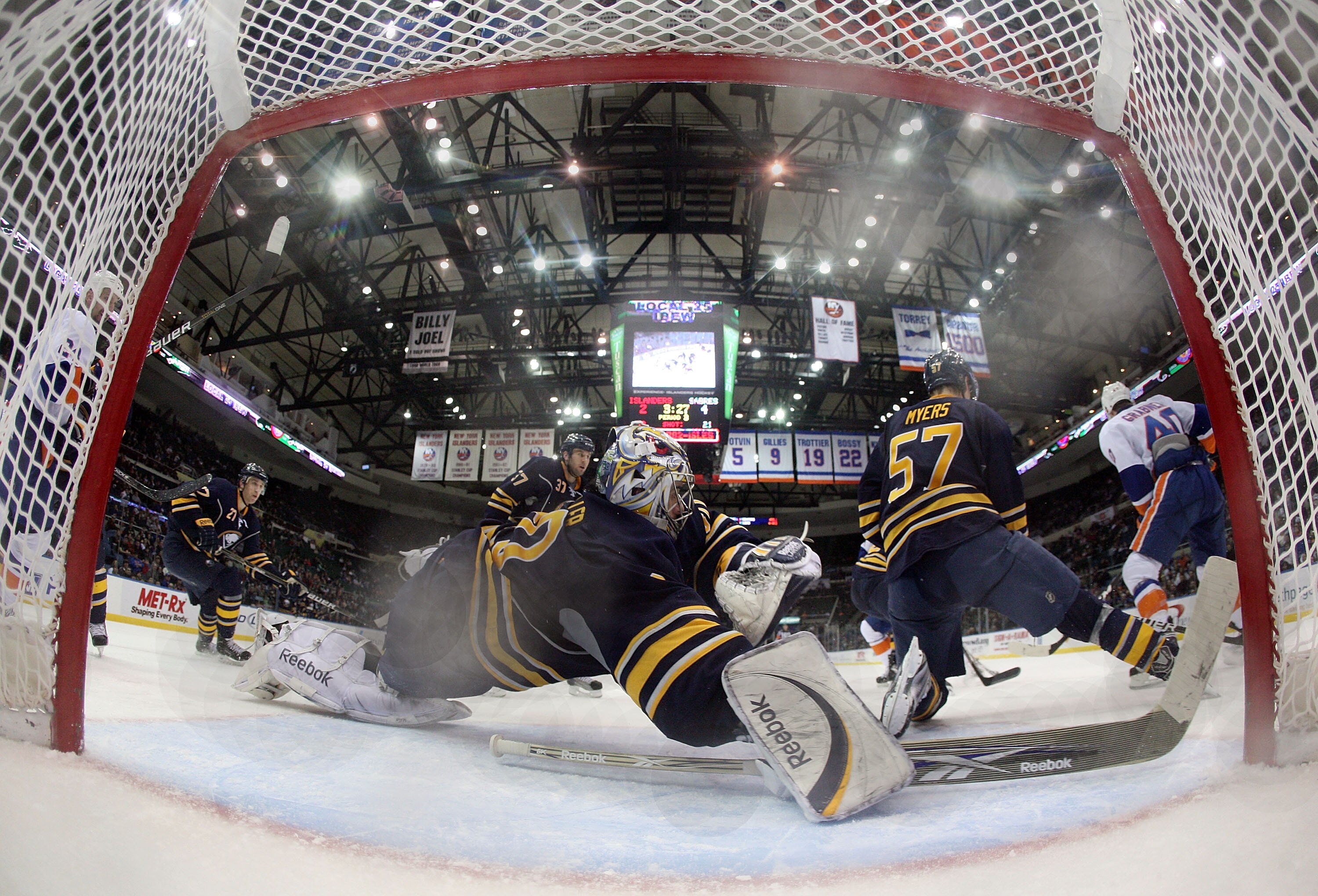 UNIONDALE, NY - JANUARY 23: Ryan Miller #30 of the Buffalo Sabres blocks the net against the New York Islanders at the Nassau Coliseum on January 23, 2011 in Uniondale, New York. The Sabres defeated the Islanders 5-3. (Photo by Bruce Bennett/Getty Images)