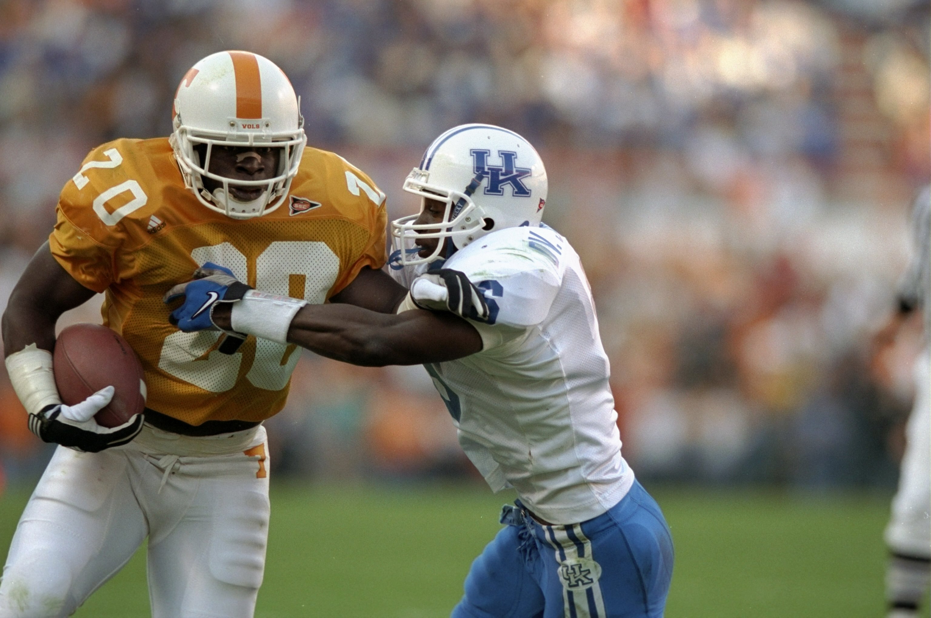 21 Nov 1998:  Running back Travis Henry #20 of the Tennessee Volunteers, left, in action during a game against the Kentucky Wildcats at Neyland Stadium in Knoxville, Tennessee. Tennessee defeated Kentucky 59-21. Mandatory Credit: Allsport/Allsport