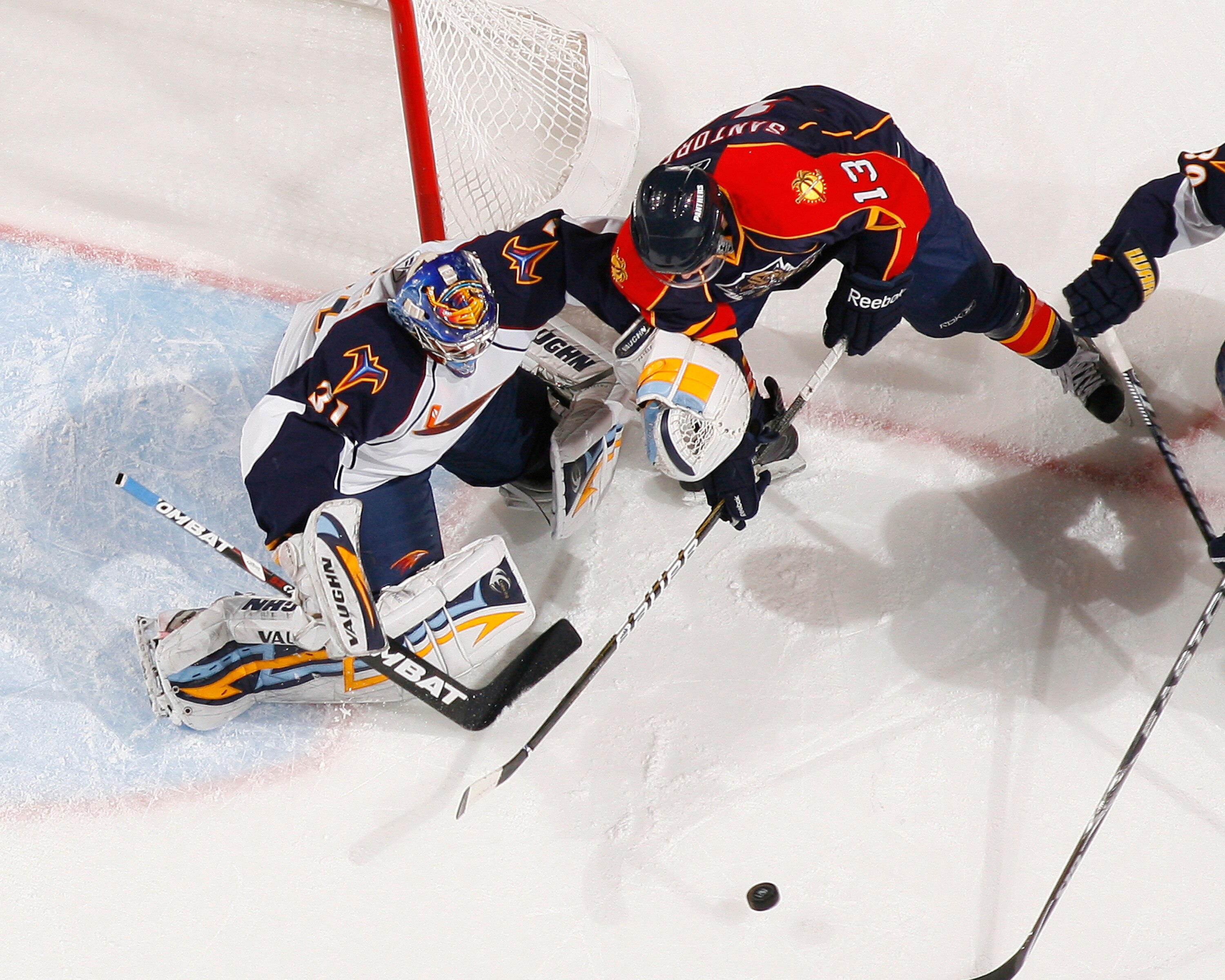 SUNRISE, FL - JANUARY 17: Goaltender Ondrej Pavelec #31 of the Atlanta Thrashers stops a shot by Michael Santorelli #13 of the Florida Panthers on January 17, 2011 at the BankAtlantic Center in Sunrise, Florida. The Thrashers defeated the Panthers 3-2 in