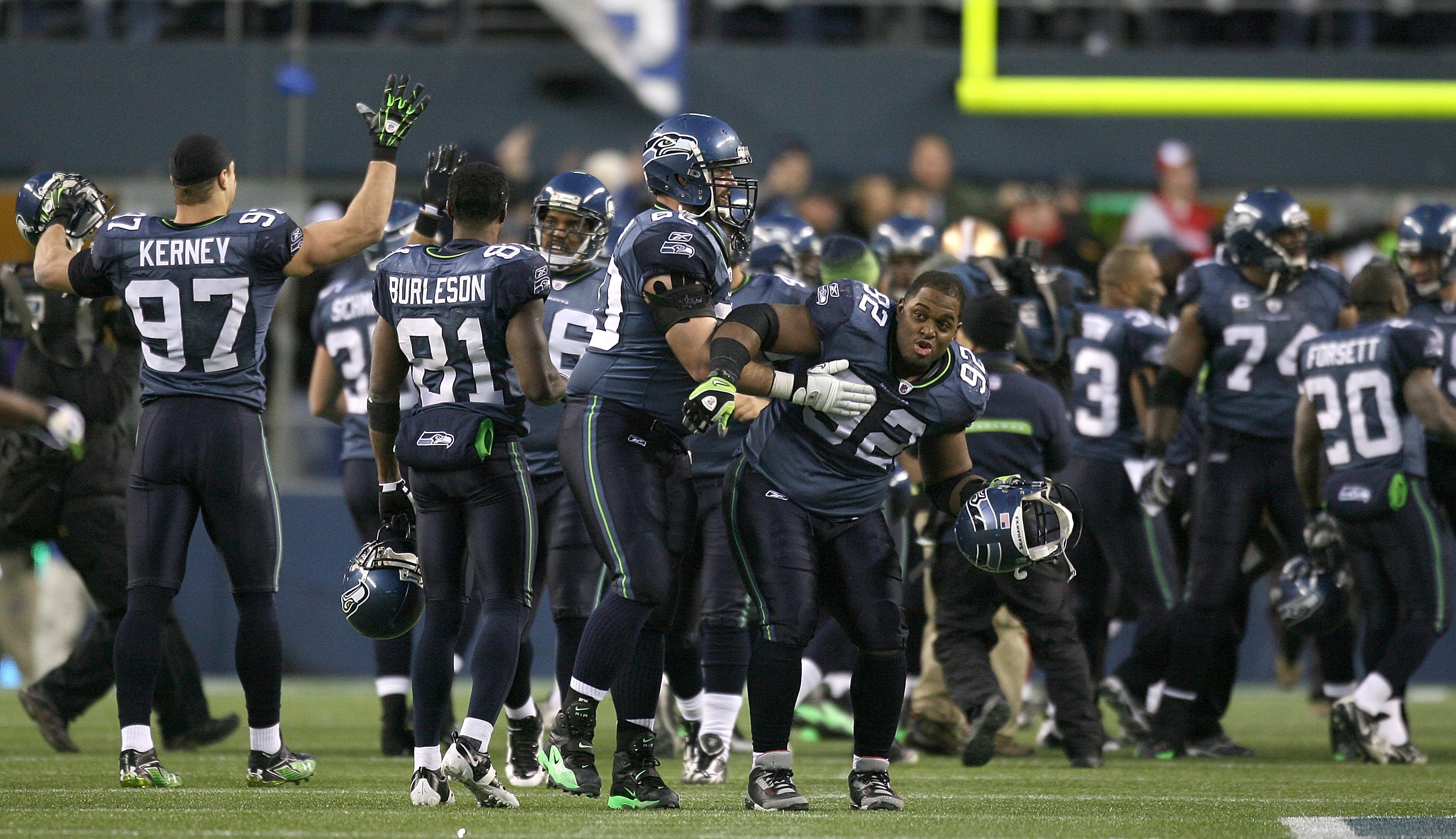 SEATTLE - DECEMBER 06:  Defensive tackle Brandon Mebane #92 of the Seattle Seahawks celebrates with teammates after defeating the San Francisco 49ers 20-17 on December 6, 2009 at Qwest Field in Seattle, Washington. (Photo by Otto Greule Jr/Getty Images)