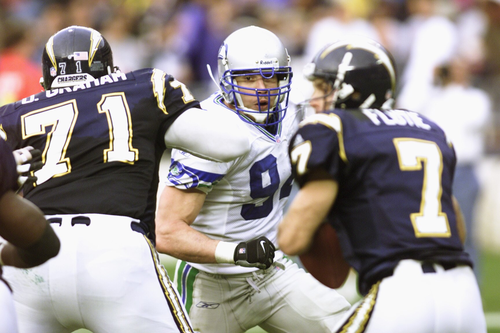 30 Dec 2001:   Chad Brown #94 linebacker for the Seattle Seahawks takes aim at San Diego Chargers quarterback Doug Flutie #7 as Chargers tackle DeMingo Graham #71 blocks at Qualcomm Stadium in San Diego, California. The Seahawks won 25-22. DIGITAL IMAGE