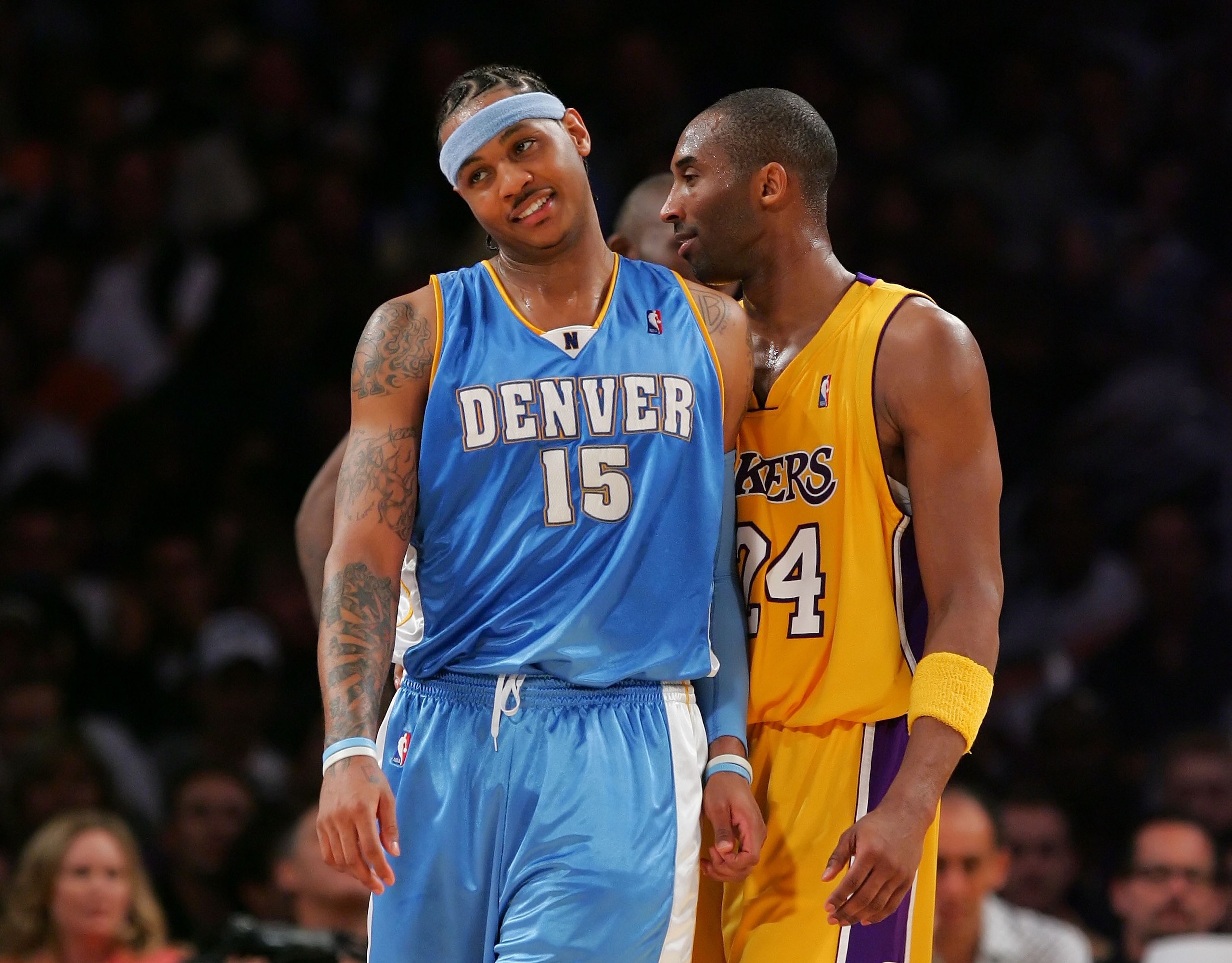 LOS ANGELES - APRIL 3: Carmello Anthony #15 (L) of the Denver Nuggets and Kobe Bryant #24 of the Los Angeles Lakers joke around during the game at Staples Center April 3, 2007 in Los Angeles, California. NOTE TO USER: User expressly acknowledges and agr LOS ANGELES - APRIL 3: Carmello Anthony #15 (L) of the Denver Nuggets and Kobe Bryant #24 of the Los Angeles Lakers joke around during the game at Staples Center April 3, 2007 in Los Angeles, California. NOTE TO USER: User expressly acknowledges and agr