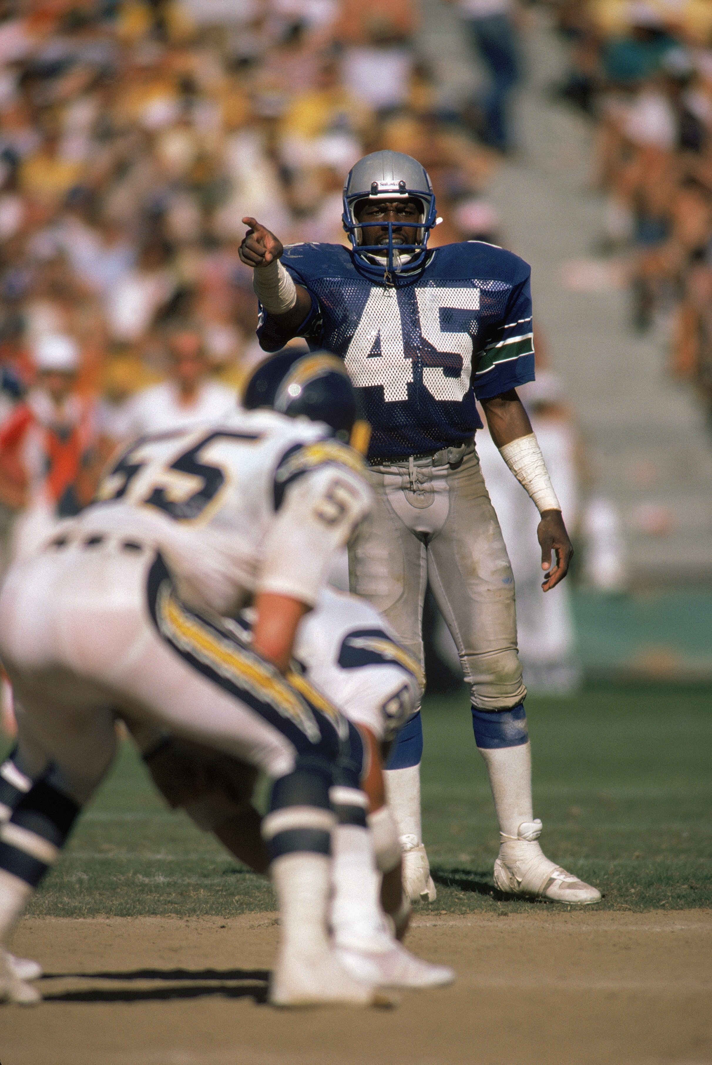 SAN DIEGO - SEPTEMBER 15:  Safety Kenny Easley #45 of the Seattle Seahawks points during the NFL game against the San Diego Chargers at Jack Murphy Stadium on September 15, 1985 in San Diego, California.  The Seahawks defeated the chargers 49-35.  (Photo