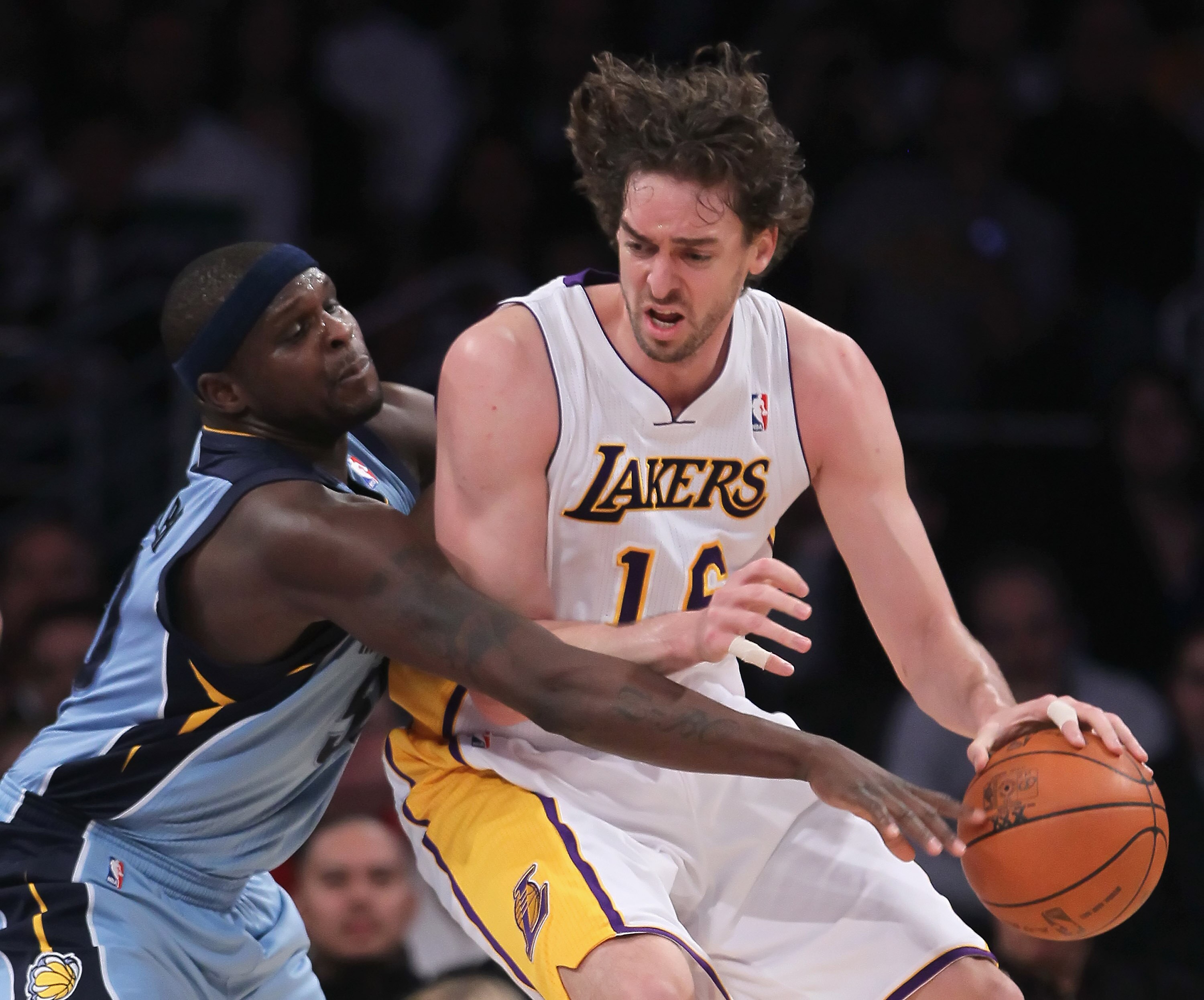 LOS ANGELES, CA - JANUARY 02:  Zach Randolph #50 of the Memphis Grizzlies attempts to steal the ball away from Pau Gasol #16 of the Los Angeles Lakers during the first half at Staples Center on January 2, 2011 in Los Angeles, California. The Grizzlies def
