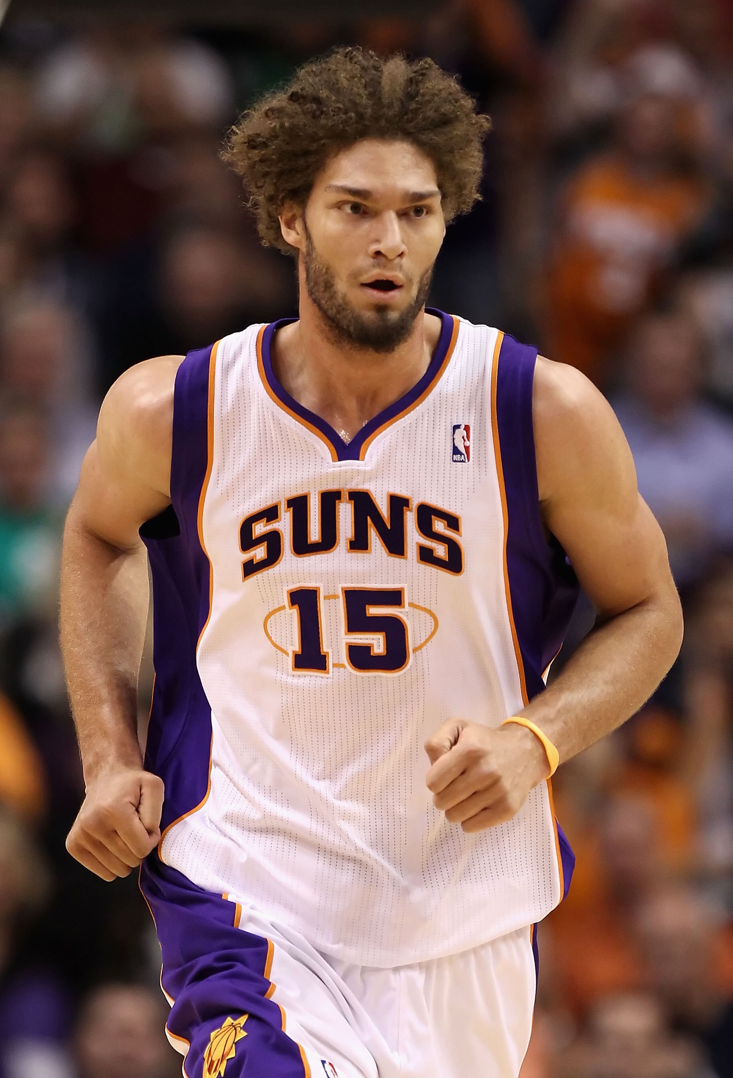 PHOENIX, AZ - JANUARY 28: Robin Lopez #15 of the Phoenix Suns during the NBA game against the Boston Celtics at US Airways Center on January 28, 2011 in Phoenix, Arizona. The Suns defeated the Celtics 88-71. NOTE TO USER: User expressly acknowledges and PHOENIX, AZ - JANUARY 28: Robin Lopez #15 of the Phoenix Suns during the NBA game against the Boston Celtics at US Airways Center on January 28, 2011 in Phoenix, Arizona. The Suns defeated the Celtics 88-71. NOTE TO USER: User expressly acknowledges and