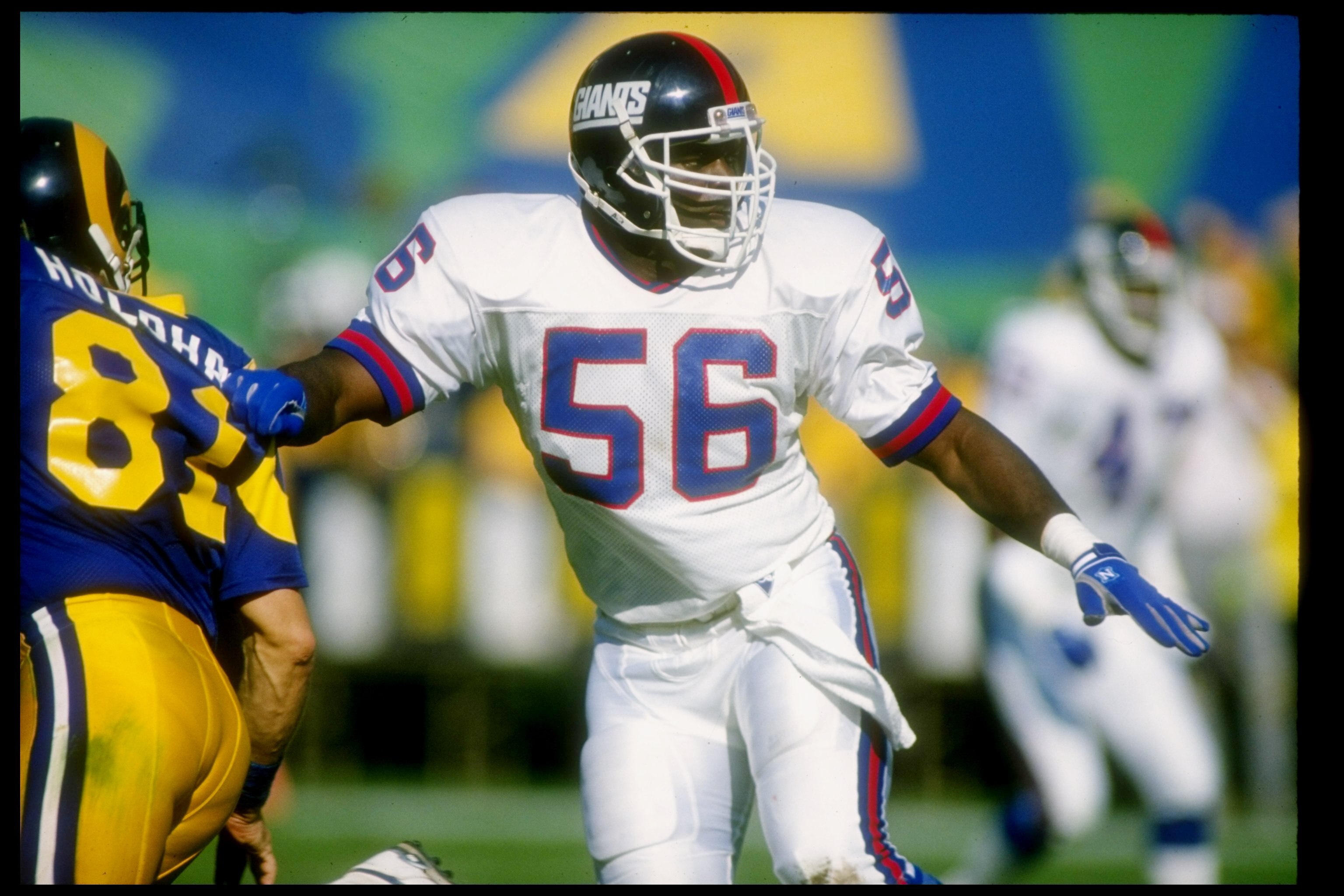 12 Nov 1989:  Linebacker Lawrence Taylor of the New York Giants looks on during a game against the Los Angeles Rams at Anaheim Stadium in Anaheim, California.  The Rams won the game, 31-10. Mandatory Credit: Stephen Dunn  /Allsport