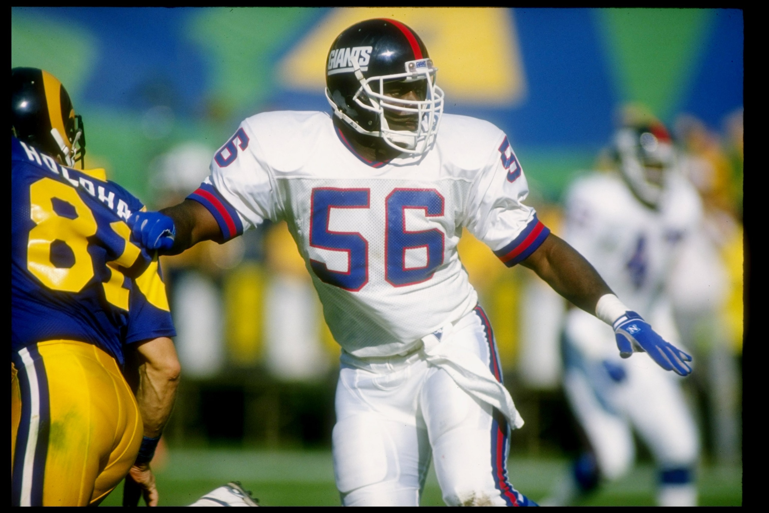 12 Nov 1989:  Linebacker Lawrence Taylor of the New York Giants looks on during a game against the Los Angeles Rams at Anaheim Stadium in Anaheim, California.  The Rams won the game, 31-10. Mandatory Credit: Stephen Dunn  /Allsport