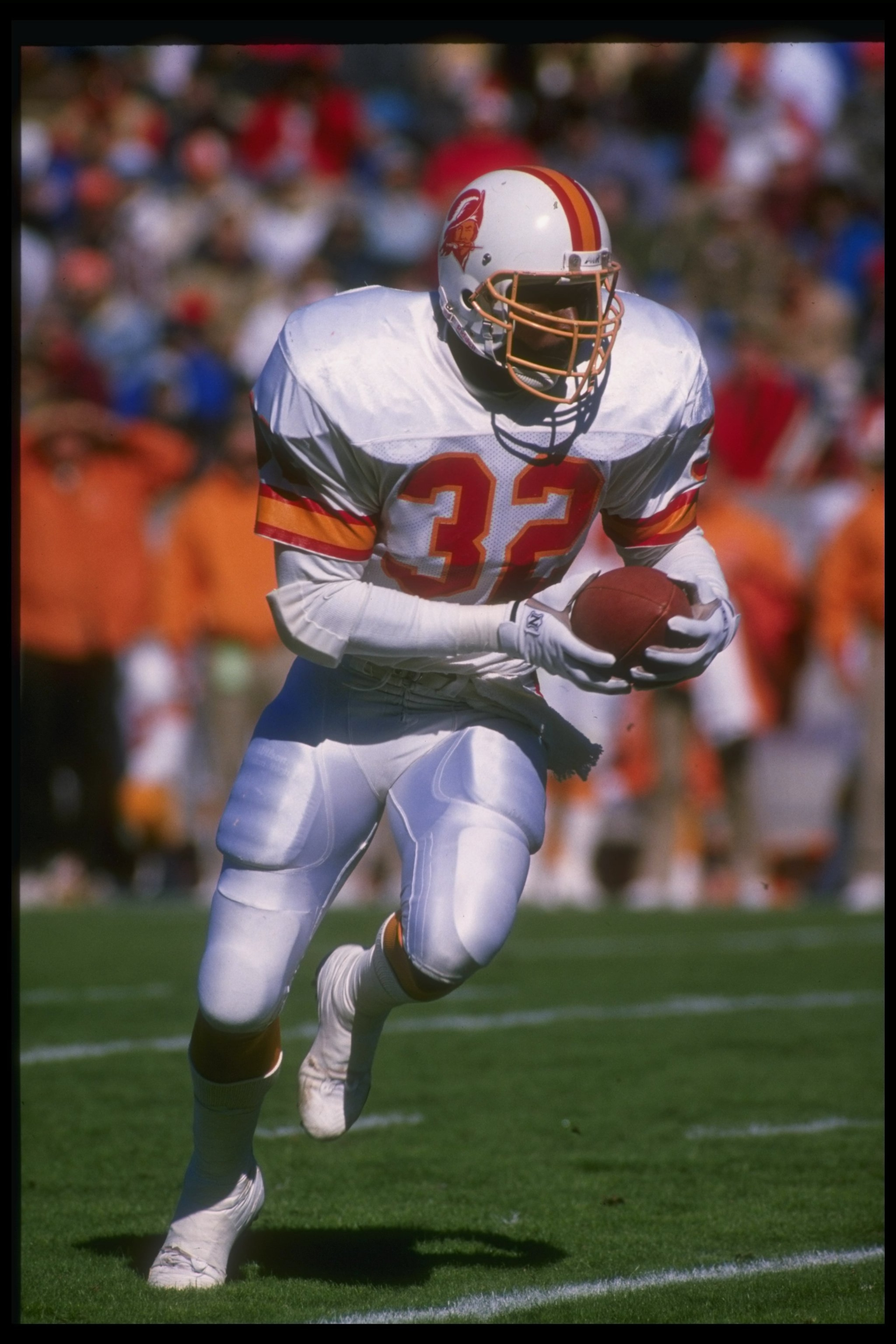 24 Dec 1989: Running back James Wilder of the Tampa Bay Buccaneers runs with the ball during a game against the Pittsburgh Steelers at Three Rivers Stadium in Pittsburgh, Pennsylvania. The Steelers won the game, 31-22.