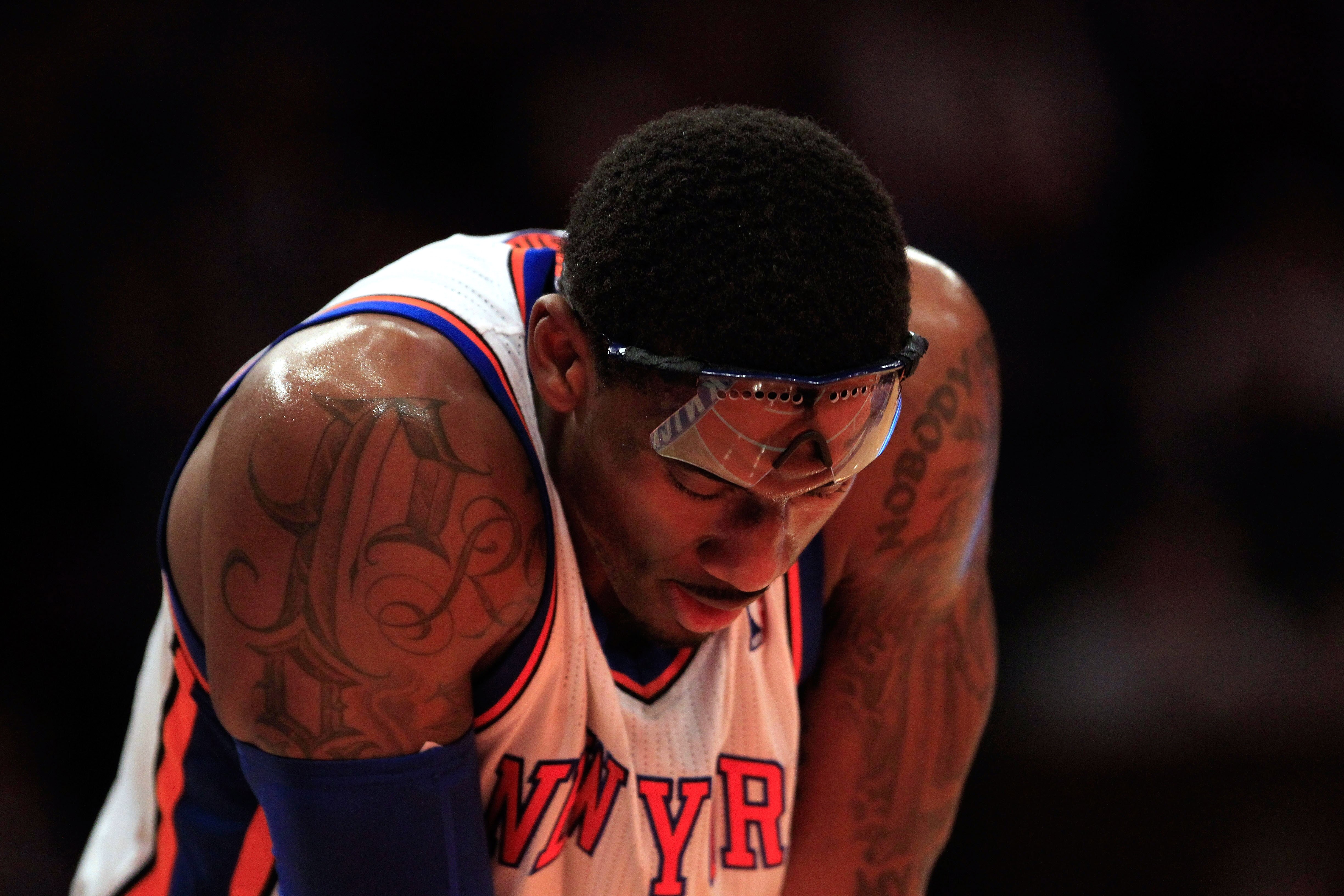 NEW YORK, NY - JANUARY 14:  Amar'e Stoudemire #1 of the New York Knicks reacts during the game against the Sacramento Kings at Madison Square Garden on January 14, 2011 in New York City. NOTE TO USER: User expressly acknowledges and agrees that, by downlo