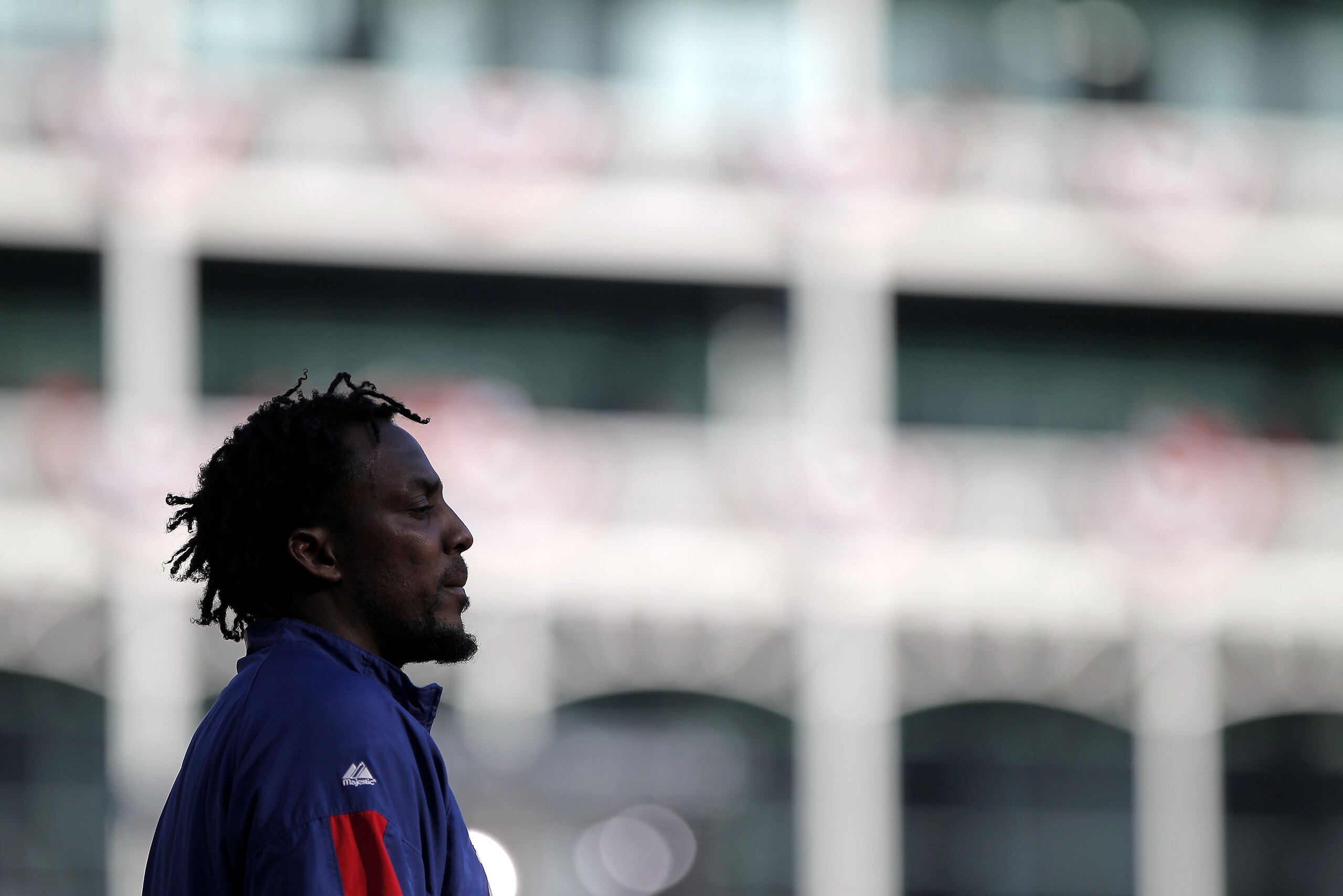 ARLINGTON, TX - NOVEMBER 01: Vladimir Guerrero #27 of the Texas Rangers looks on during batting practice against the San Francisco Giants in Game Five of the 2010 MLB World Series at Rangers Ballpark in Arlington on November 1, 2010 in Arlington, Texas. ARLINGTON, TX - NOVEMBER 01: Vladimir Guerrero #27 of the Texas Rangers looks on during batting practice against the San Francisco Giants in Game Five of the 2010 MLB World Series at Rangers Ballpark in Arlington on November 1, 2010 in Arlington, Texas.
