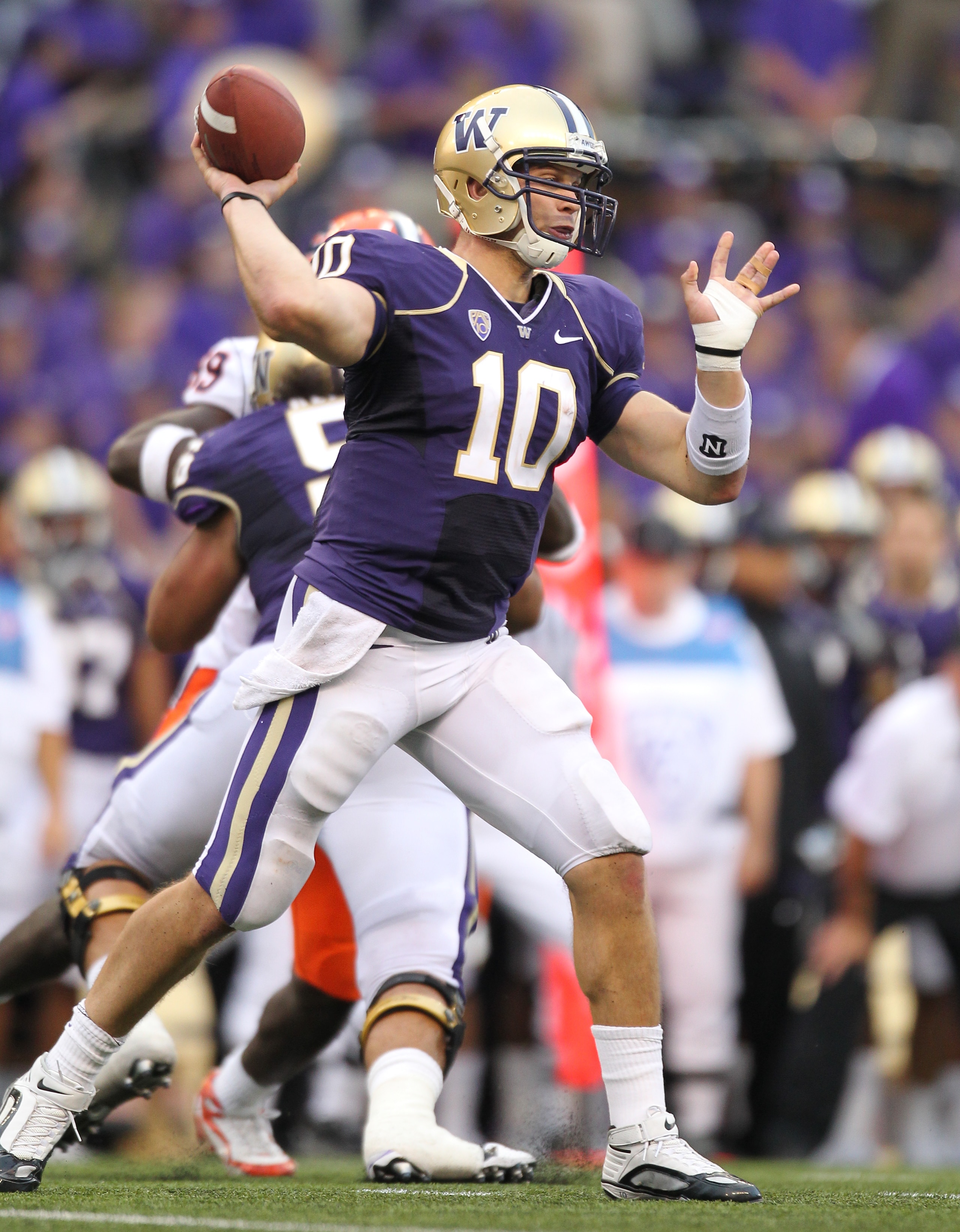 SEATTLE - SEPTEMBER 11:  Quarterback Jake Locker #10 of the Washington Huskies passes against the Syracuse Orange on September 11, 2010 at Husky Stadium in Seattle, Washington. (Photo by Otto Greule Jr/Getty Images)