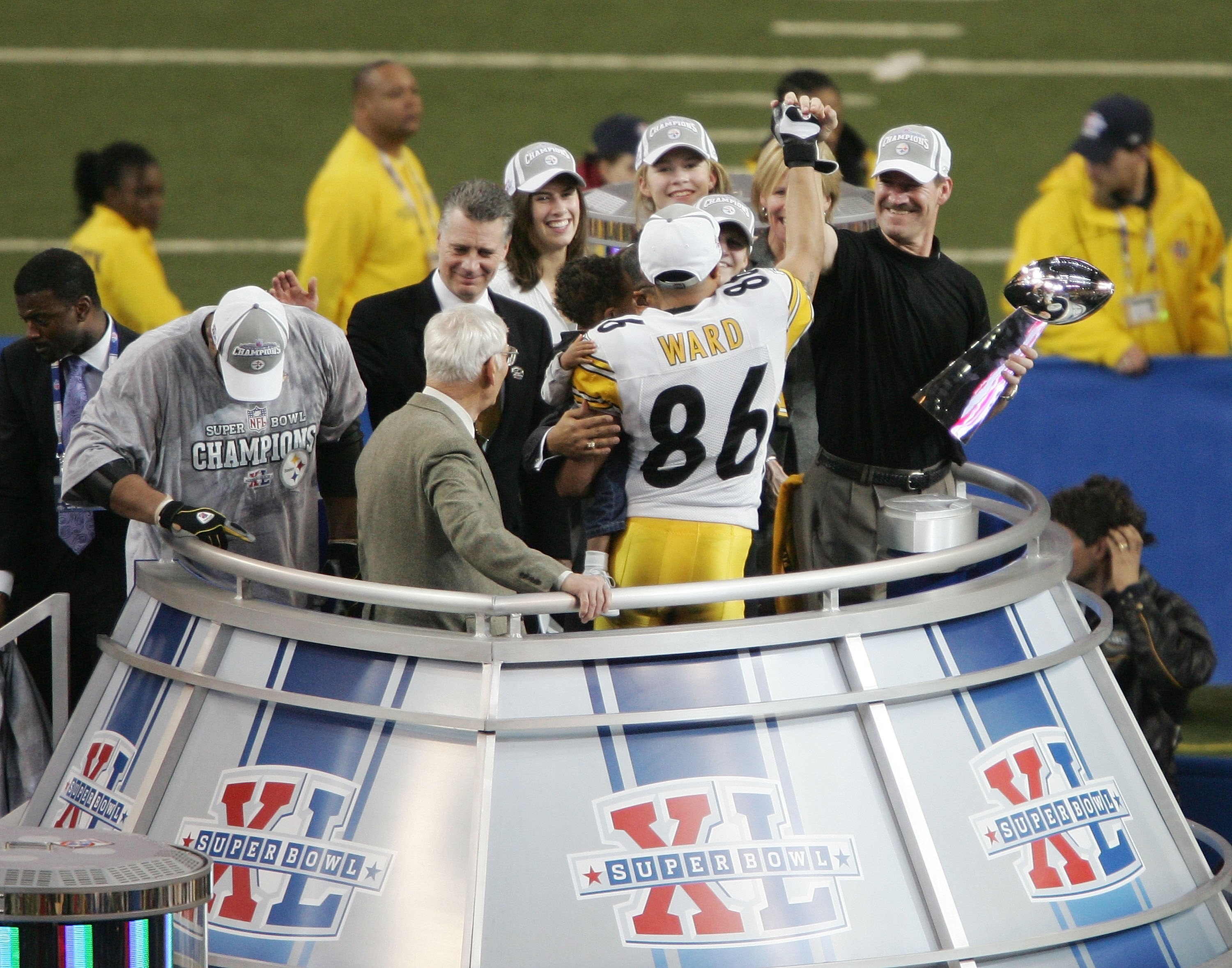 DETROIT - FEBRUARY 05:  Head coach Bill Cowher of the Pittsburgh Steelers celebrates with game MVP Hines Ward #86 and with the Vince Lombardi Tropy after defeating the Seattle Seahawks in Super Bowl XL at Ford Field on February 5, 2006 in Detroit, Michiga