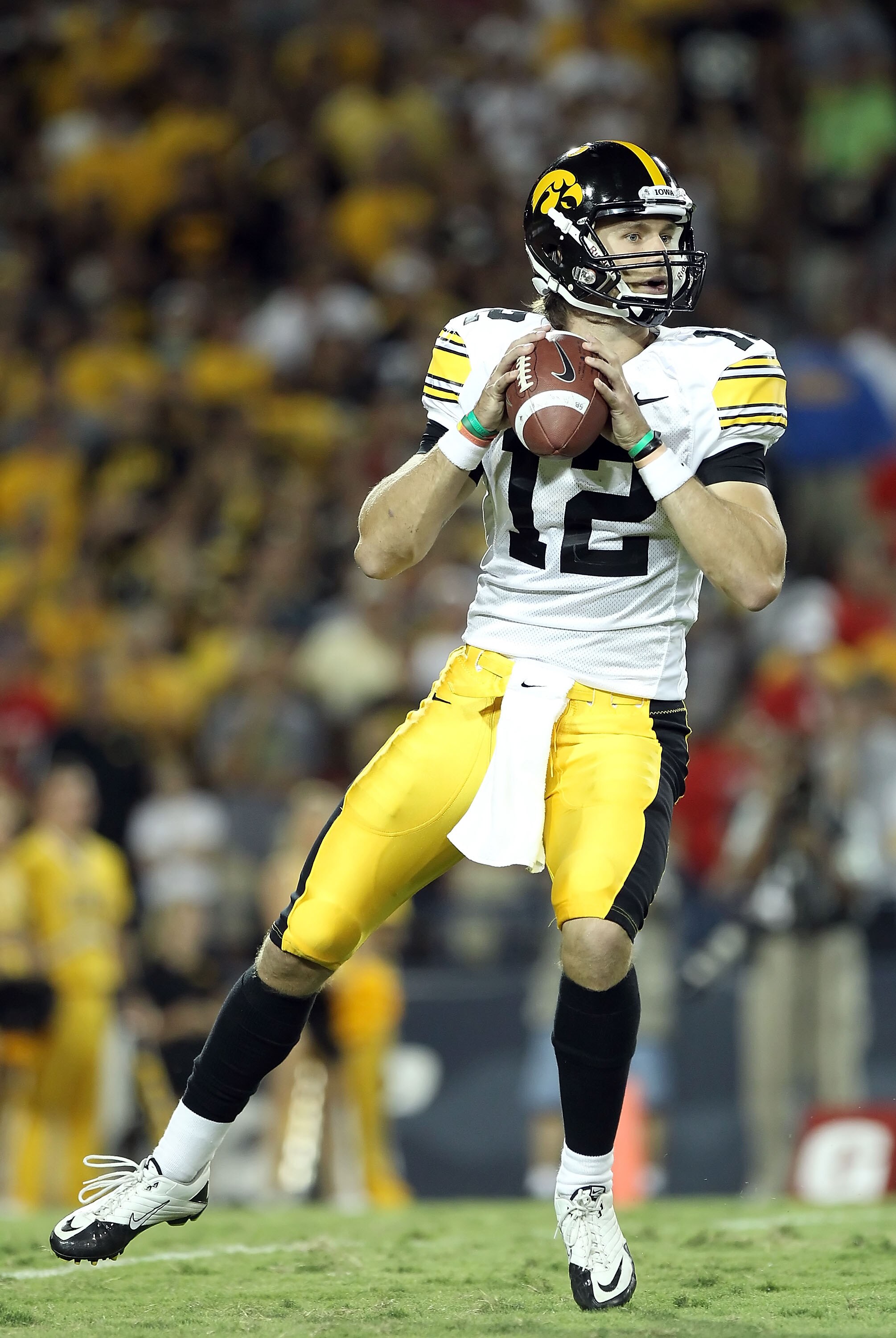 TUCSON, AZ - SEPTEMBER 18:  Quarterback Ricky Stanzi #12 of the Iowa Hawkeyes in action during the college football game against the Arizona Wildcats at Arizona Stadium on September 18, 2010 in Tucson, Arizona.  The Wildcats defeated the Hawkeyes 34-27.