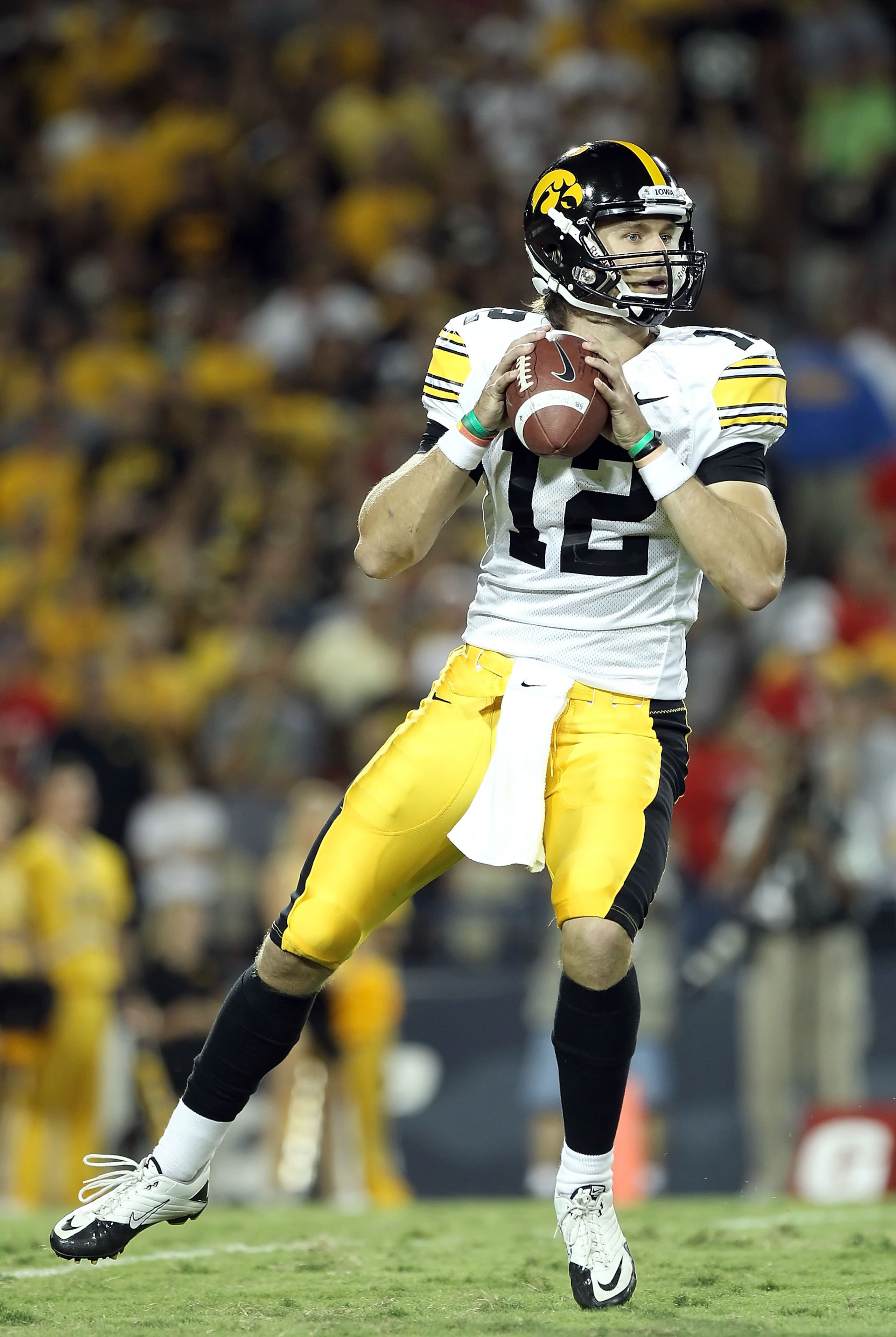 TUCSON, AZ - SEPTEMBER 18:  Quarterback Ricky Stanzi #12 of the Iowa Hawkeyes in action during the college football game against the Arizona Wildcats at Arizona Stadium on September 18, 2010 in Tucson, Arizona.  The Wildcats defeated the Hawkeyes 34-27.