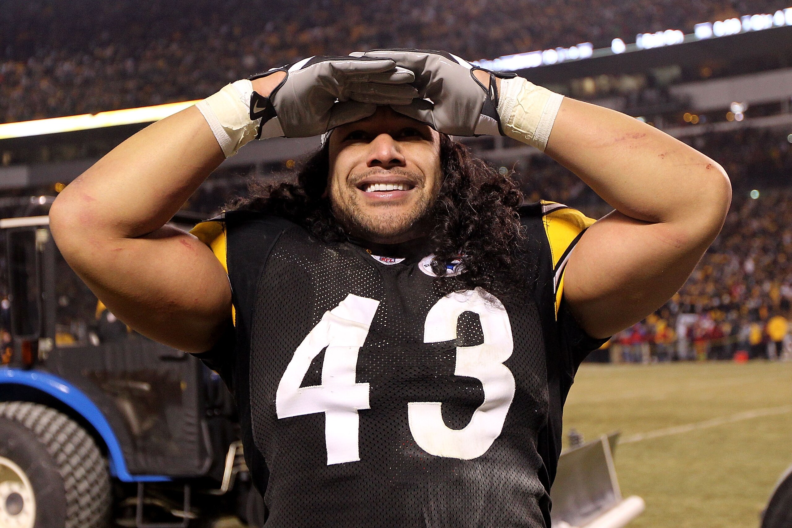 PITTSBURGH, PA - JANUARY 23:  Troy Polamalu #43 of the Pittsburgh Steelers celebrates their 24 to 19 win over the New York Jets in the 2011 AFC Championship game at Heinz Field on January 23, 2011 in Pittsburgh, Pennsylvania.  (Photo by Nick Laham/Getty I