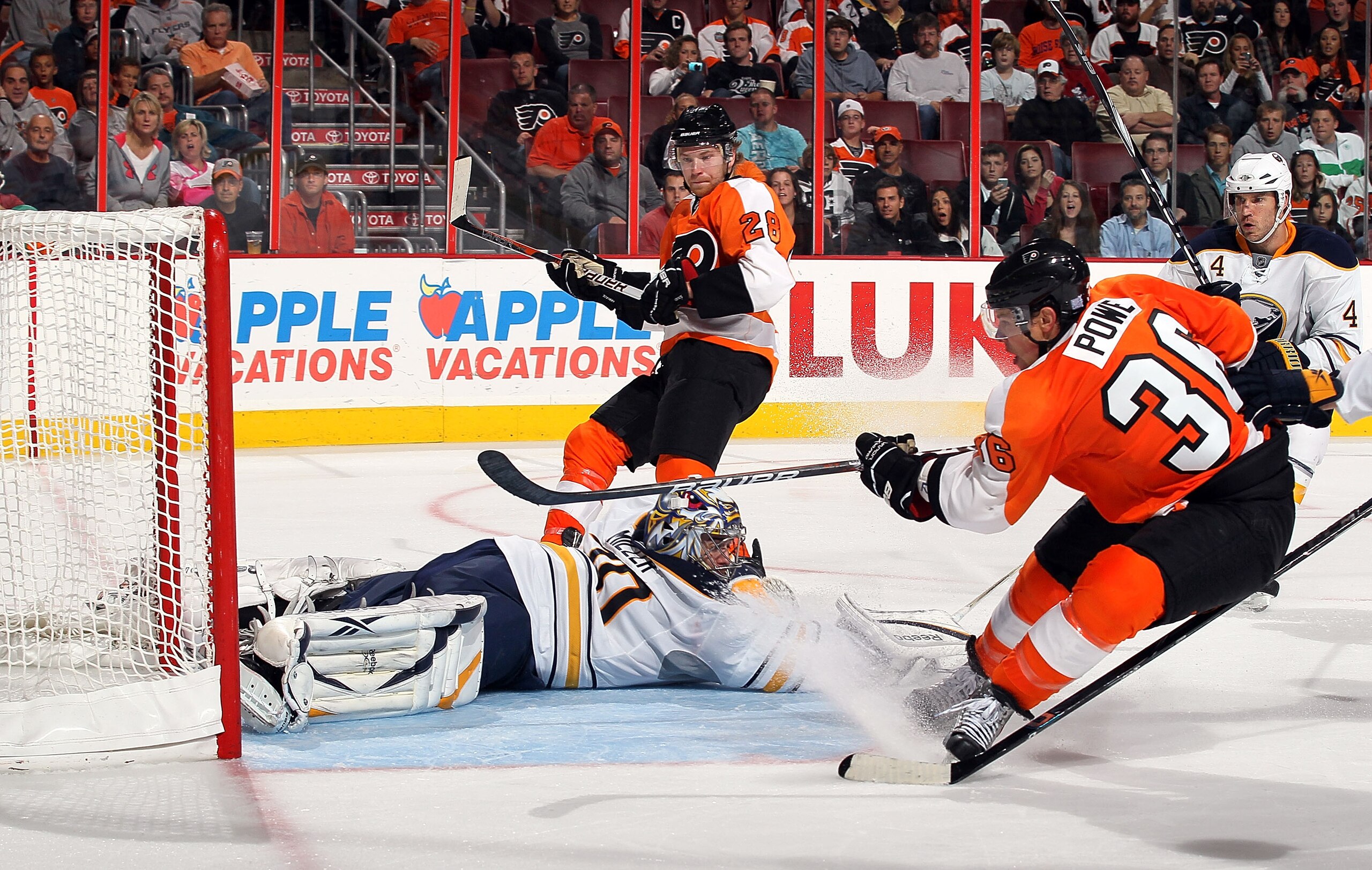 PHILADELPHIA - OCTOBER 26:  Darroll Powe #36 of the Philadelphia Flyers scores a second period goal past Ryan Miller #30 after a pass from teammate Claude Giroux #28 on October 26, 2010 at Wells Fargo Center in Philadelphia, Pennsylvania.  (Photo by Jim M