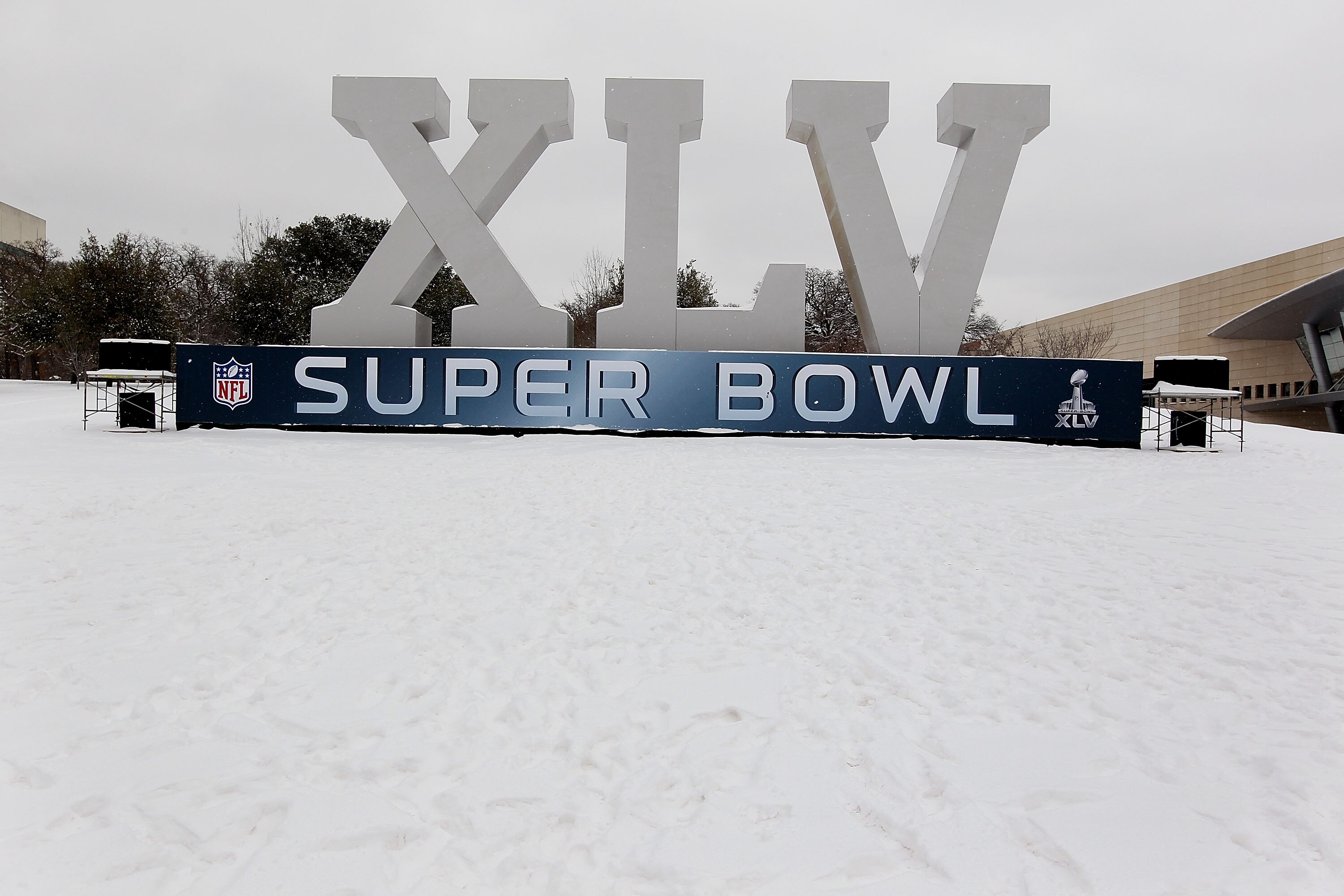 DALLAS - FEBRUARY 04:  A Super Bowl XLV sign stands  after a snowstorm hit the Dallas area February 4, 2011 in Dallas, Texas. More than four inches of snow fell overnight in the North Texas area. The Green Bay Packers will play the Pittsburgh Steelers in 
