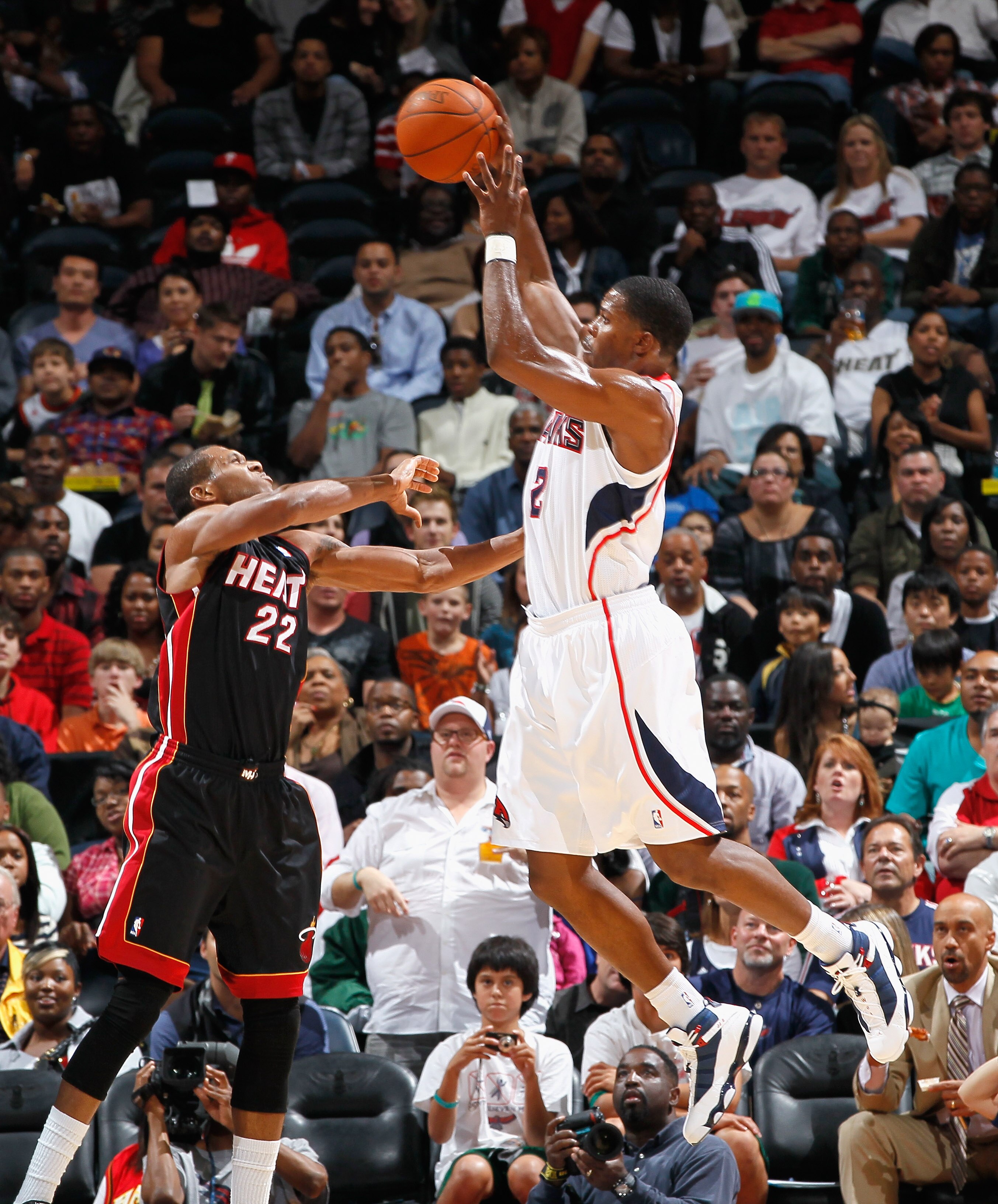ATLANTA - OCTOBER 21:  Joe Johnson #2 of the Atlanta Hawks against James Jones #22 of the Miami Heat at Philips Arena on October 21, 2010 in Atlanta, Georgia.  (Photo by Kevin C. Cox/Getty Images)