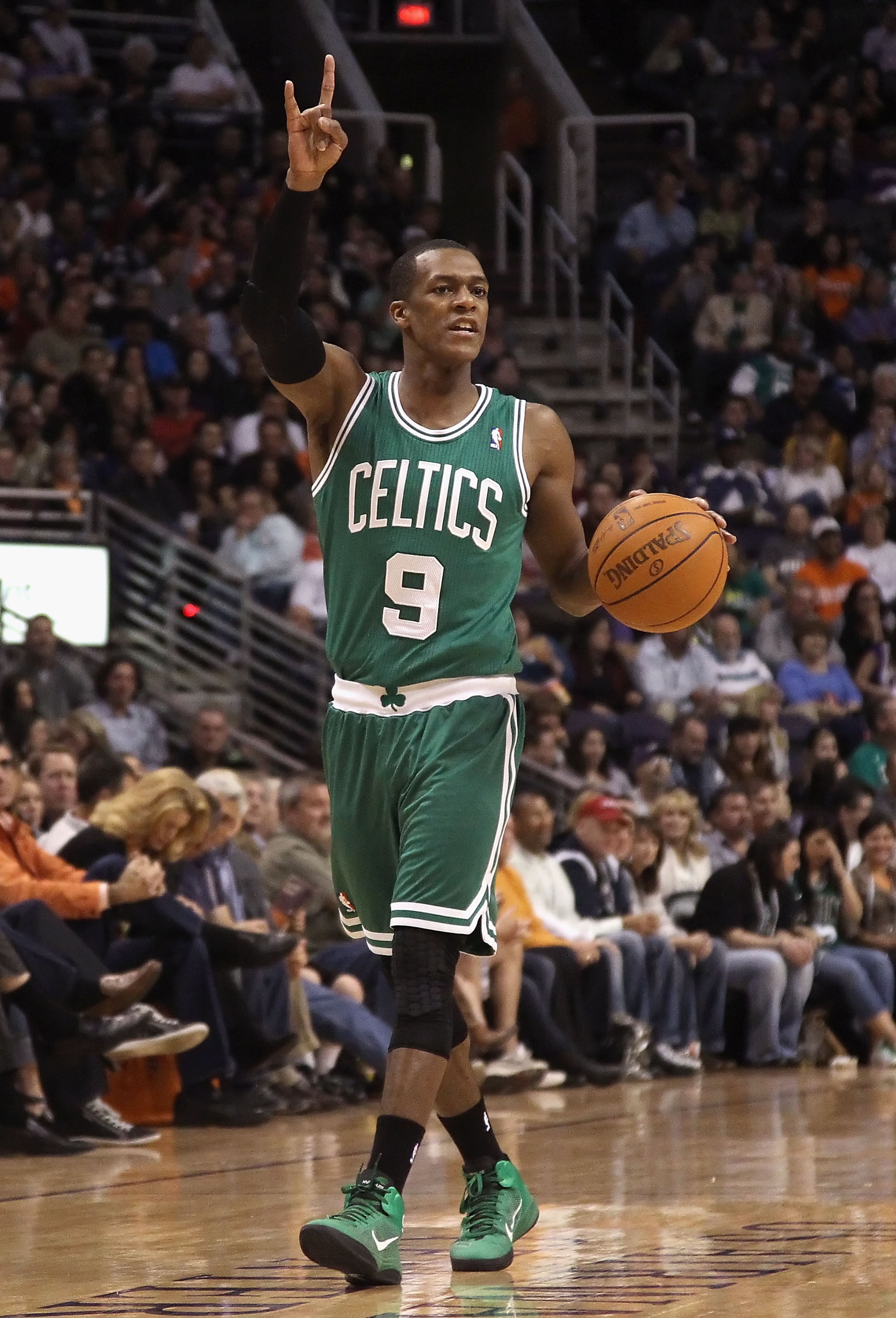 PHOENIX, AZ - JANUARY 28:  Rajon Rondo #9 of the Boston Celtics handles the ball during the NBA game against the Phoenix Suns at US Airways Center on January 28, 2011 in Phoenix, Arizona.  The Suns defeated the Celtics 88-71.  NOTE TO USER: User expressly