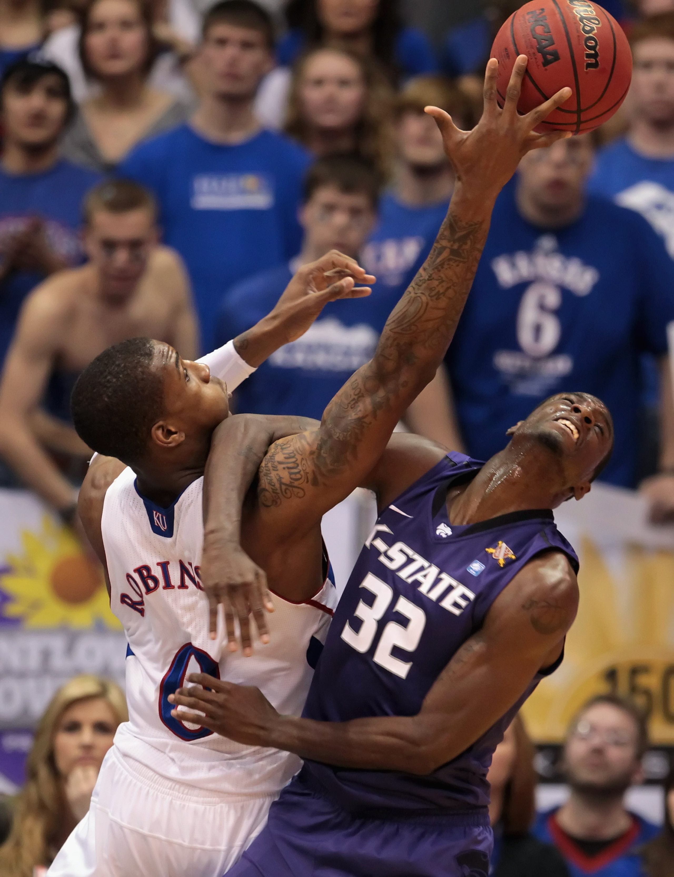 LAWRENCE, KS - JANUARY 29: Jamar Samuels #32 of the Kansas State Wildcats battles Thomas Robinson #0 of the Kansas Jayhawks for a loose ball during the game on January 29, 2011 at Allen Fieldhouse in Lawrence, Kansas. (Photo by Jamie Squire/Getty Images LAWRENCE, KS - JANUARY 29: Jamar Samuels #32 of the Kansas State Wildcats battles Thomas Robinson #0 of the Kansas Jayhawks for a loose ball during the game on January 29, 2011 at Allen Fieldhouse in Lawrence, Kansas. (Photo by Jamie Squire/Getty Images
