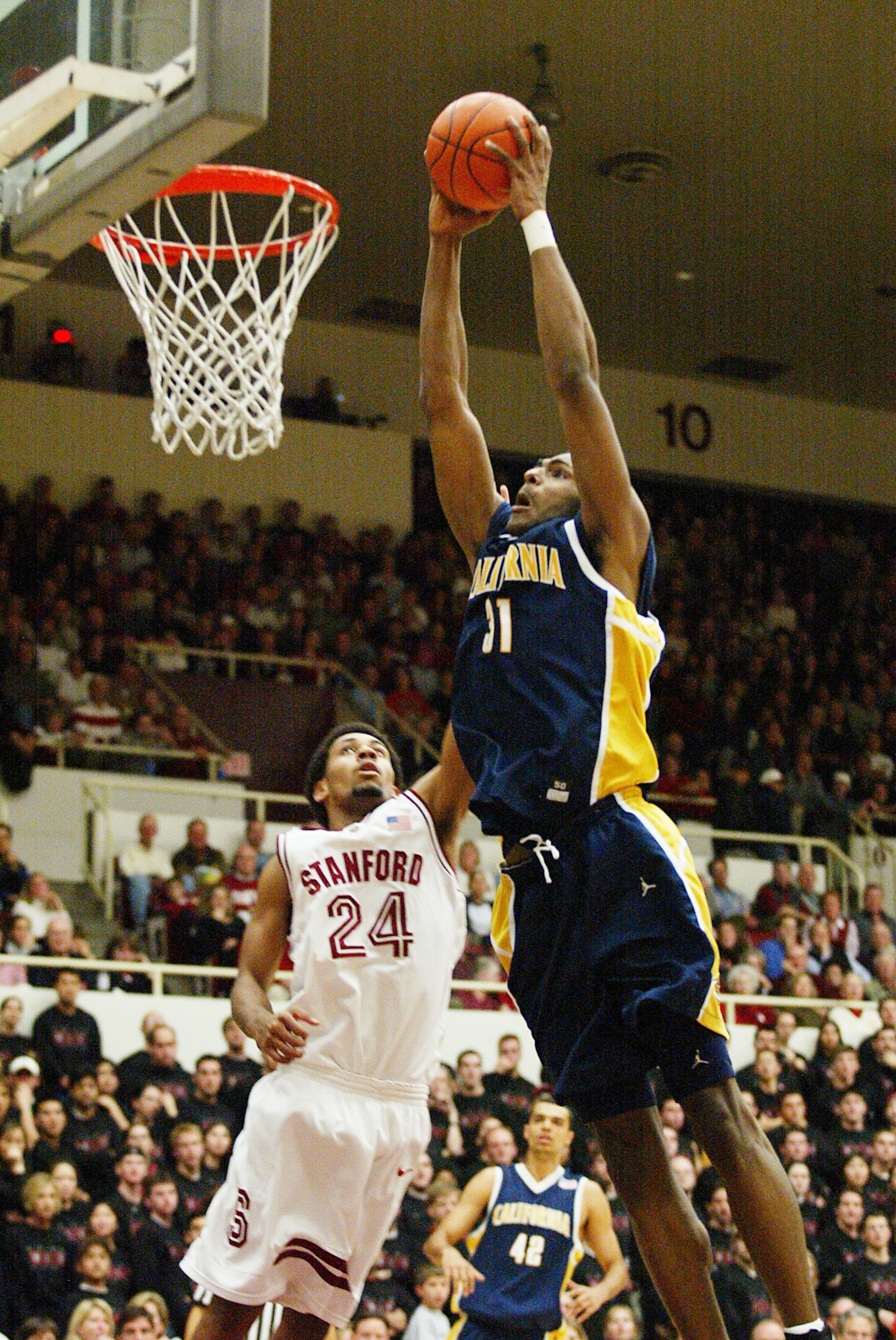 4 Jan 2002: Jamal Sampson of the University of California shoots over Julis Barnes of Stanford during a Pac-10 game at Maples Pavillion at Stanford University in Palo Alto, California. DIGITAL IMAGE Mandatory Credit: Jed Jacobsohn/Getty Images 4 Jan 2002: Jamal Sampson of the University of California shoots over Julis Barnes of Stanford during a Pac-10 game at Maples Pavillion at Stanford University in Palo Alto, California. DIGITAL IMAGE Mandatory Credit: Jed Jacobsohn/Getty Images