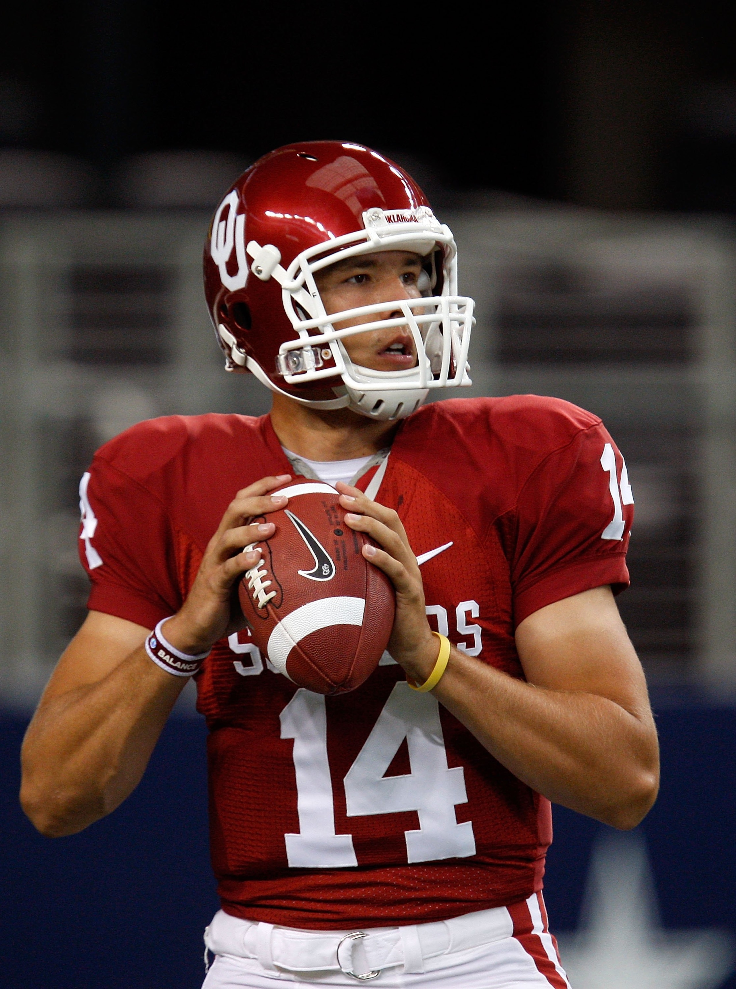 ARLINGTON, TX - SEPTEMBER 05:  Quarterback Sam Bradford #14 of the Oklahoma Sooners warms up before a game against the Brigham Young Cougars at Cowboys Stadium on September 5, 2009 in Arlington, Texas.  (Photo by Ronald Martinez/Getty Images)