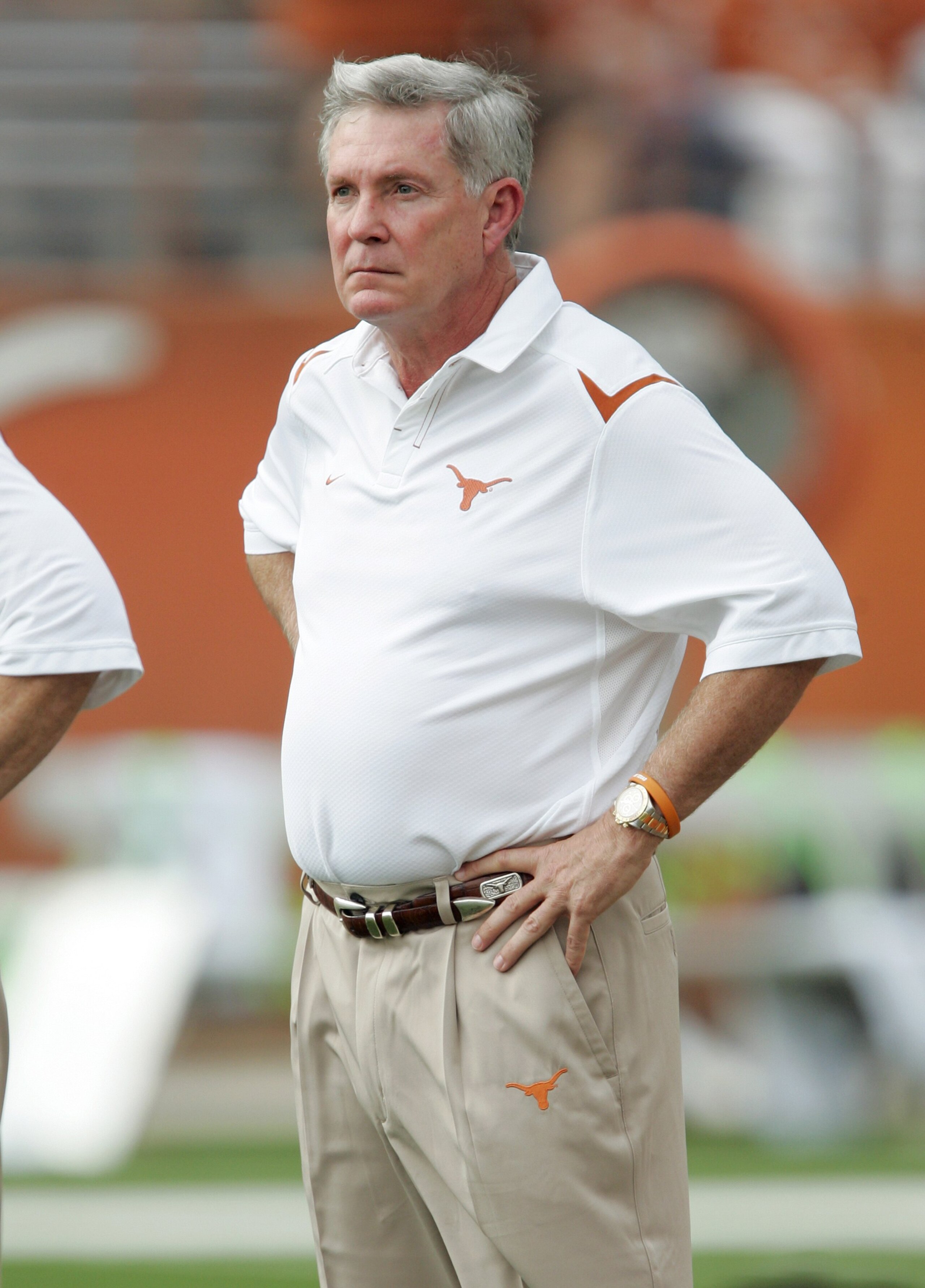 AUSTIN, TX - SEPTEMBER 5: Head Coach Mac Brown of the Texas Longhorns looks on during warm-up prior to their game against the Louisiana Monroe Warhawks on September 5, 2009 at Darrell K Royal-Texas Memorial Stadium in Austin, Texas. The Longhorns defeate AUSTIN, TX - SEPTEMBER 5: Head Coach Mac Brown of the Texas Longhorns looks on during warm-up prior to their game against the Louisiana Monroe Warhawks on September 5, 2009 at Darrell K Royal-Texas Memorial Stadium in Austin, Texas. The Longhorns defeate
