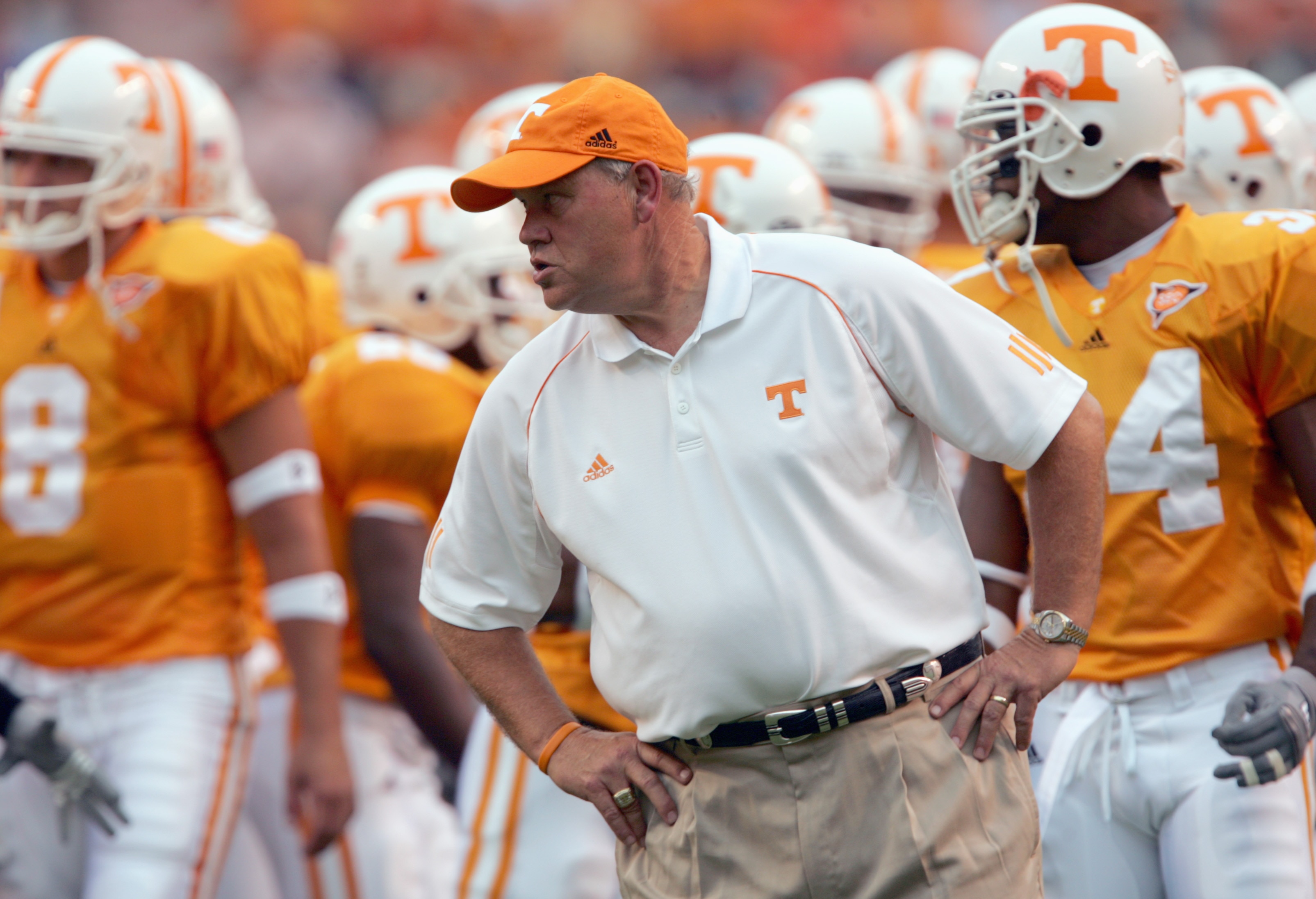 KNOXVILLE, TN - SEPTEMBER 9: Head coach Phillip Fullmer of the University of Tennessee Volunteers stands on the field with his team after pre-game warmups before the game with the Air Force Academy Falcons on September 9, 2006 at Neyland Stadium in Knoxvi
