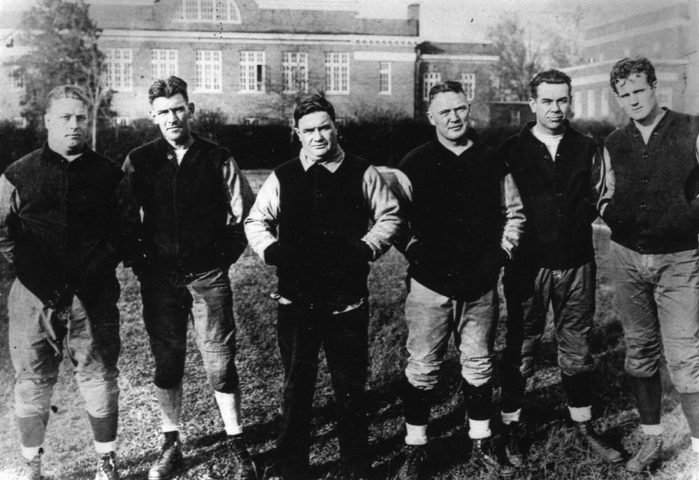There's a whole heap of coaching talent in this photo; Thomas is at center, but who's that on the far right?