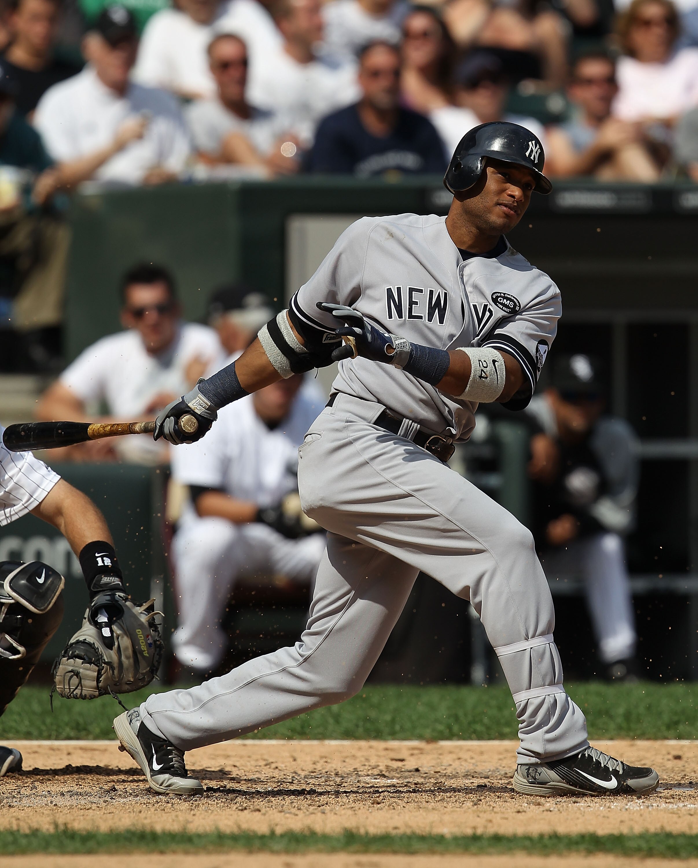 CHICAGO - AUGUST 29: Robinson Cano #24 of the New York Yankees hits the ball against the Chicago White Sox at U.S. Cellular Field on August 29, 2010 in Chicago, Illinois. The Yankees defeated the White Sox 2-1. (Photo by Jonathan Daniel/Getty Images)