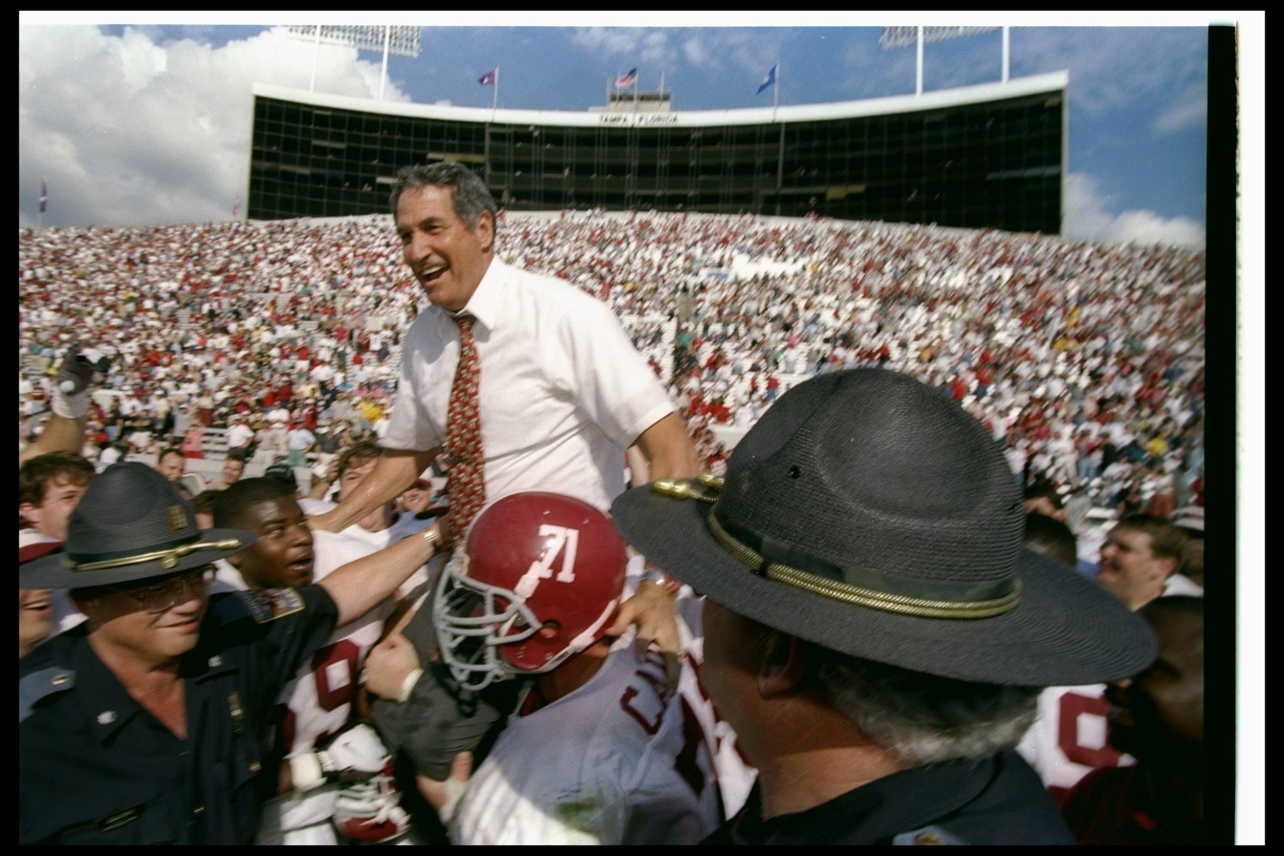 Alabama Crimson Tide head coach Gene Stallings celebrates after the Outback Bowl against the Michigan Wolverines in Tampa, Florida. Alabama won the game, 17-14.