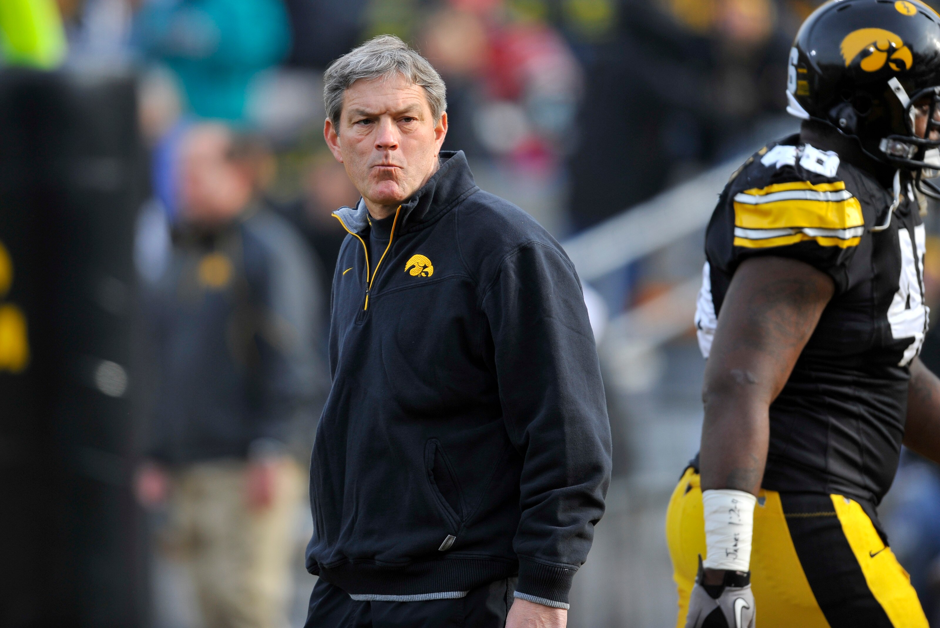 IOWA CITY, IA - NOVEMBER 20: University of Iowa Hawkeyes head coach Kirk Ferentz looks on from the sideline during pre game warm ups before game action against the Ohio State Buckeyes at Kinnick Stadium on November 20, 2010 in Iowa City, Iowa. Ohio State 