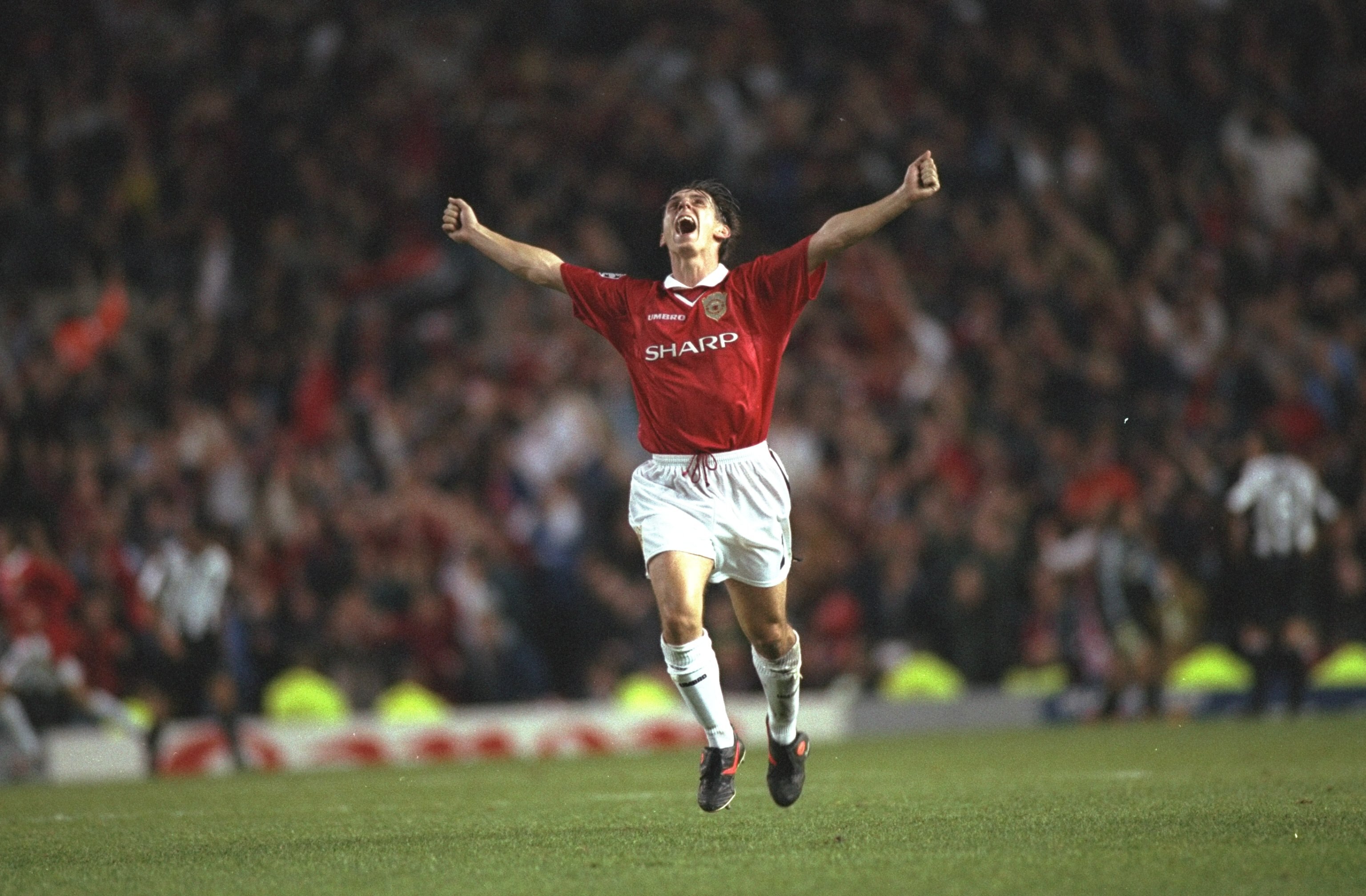 1 Oct 1997:  Gary Neville of Manchester United celebrates a goal during the Champions League match against Juventus at Old Trafford in Manchester, England. Manchester United won the match 3-2. \ Mandatory Credit: Shaun Botterill /Allsport