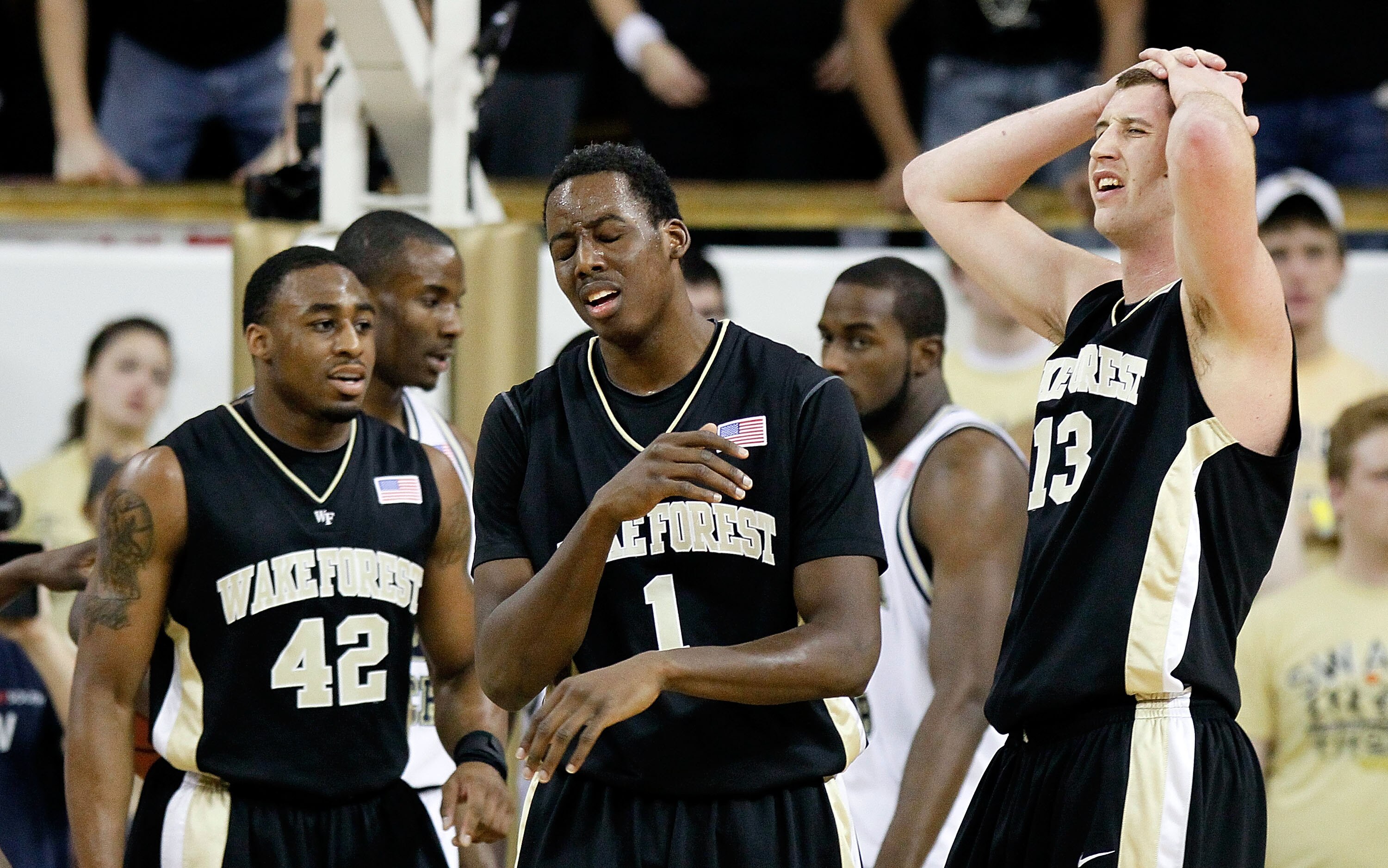 ATLANTA - JANUARY 28:  Al-Farouq Aminu #1 and Chas McFarland #13 of the Wake Forest Demon Deacons react after a turnover during the game against the Georgia Tech Yellow Jackets at Alexander Memorial Coliseum on January 28, 2010 in Atlanta, Georgia.  (Phot