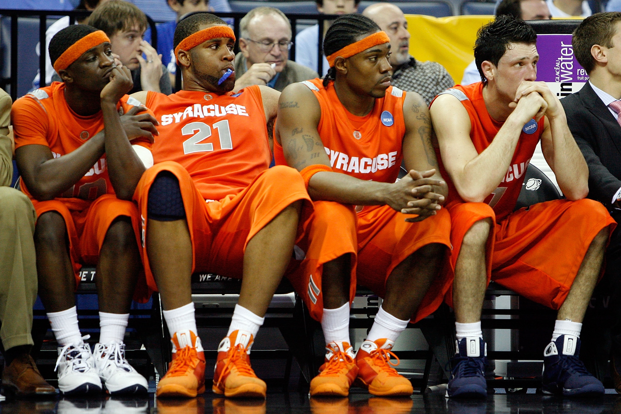 MEMPHIS, TN - MARCH 27: (L-R) Jonny Flynn #10, Arinze Onuaku #21, Paul Harris #11 and Andy Rautins #1 of the Syracuse Orange sit on the bench late in the second half before losing to the Oklahoma Sooners during the NCAA Men's Basketball Tournament South MEMPHIS, TN - MARCH 27: (L-R) Jonny Flynn #10, Arinze Onuaku #21, Paul Harris #11 and Andy Rautins #1 of the Syracuse Orange sit on the bench late in the second half before losing to the Oklahoma Sooners during the NCAA Men's Basketball Tournament South