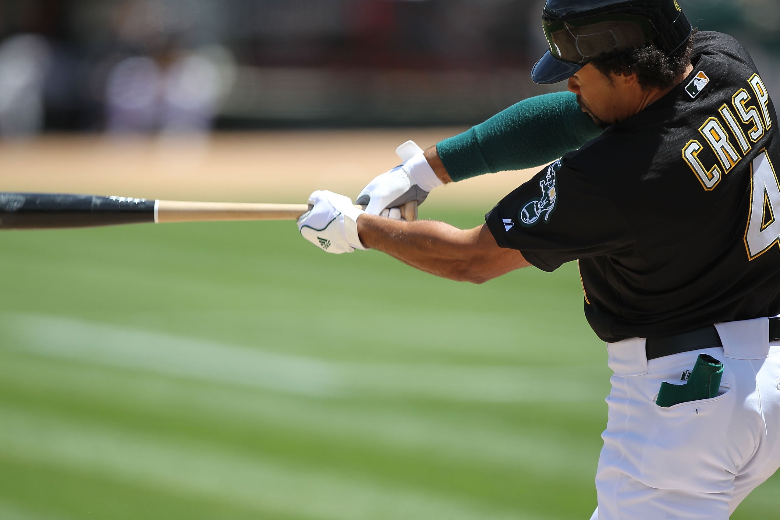 OAKLAND, CA - MAY 22:  Coco Crisp #4 of the Oakland Athletics bats against the San Francisco Giants during an MLB game at the Oakland-Alameda County Coliseum on May 22, 2010 in Oakland, California.  (Photo by Jed Jacobsohn/Getty Images)