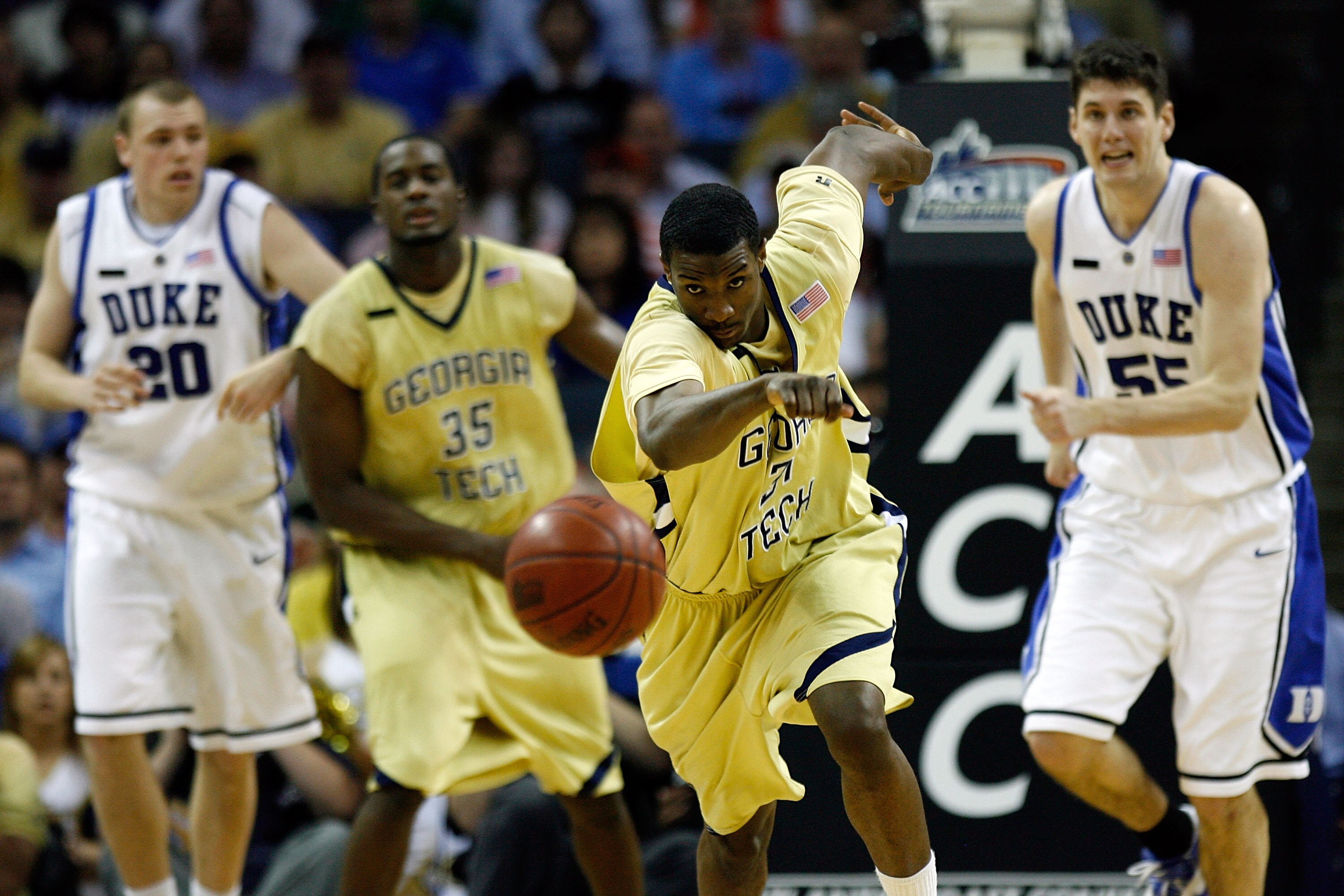 CHARLOTTE, NC - MARCH 14:  Ganai Lawal #31 of the Georgia Tech Yellow Jackets goes after a loose ball in front of Brian Zoubek #55 of the Duke Blue Devils during day two of the 2008 Men's ACC Basketball Tournament at Bobcats Arena on March 14, 2008 in Cha