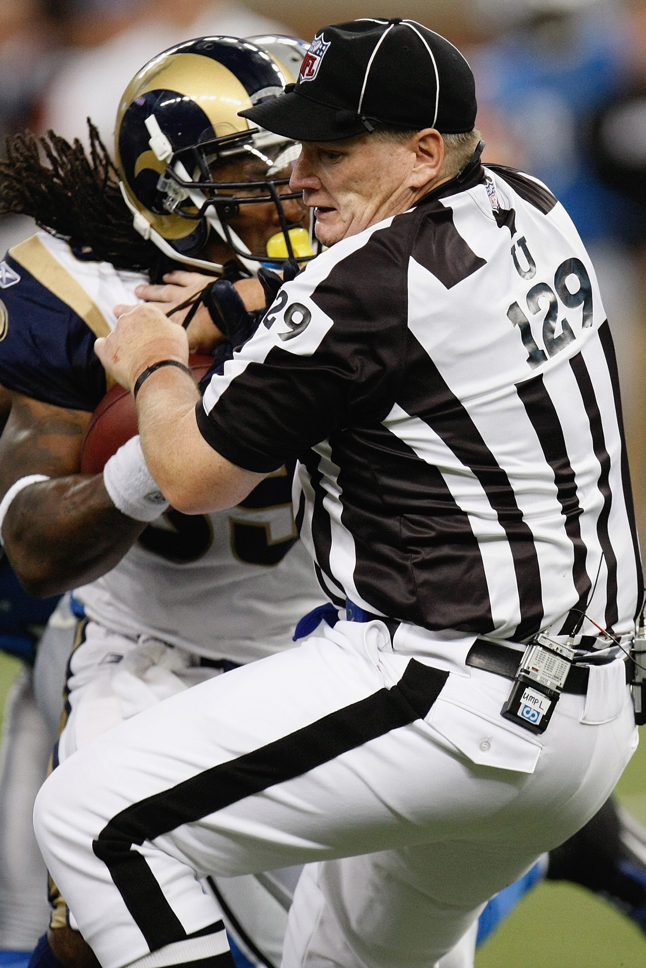 DETROIT - NOVEMBER 1:  Steven Jackson #39 of the St. Louis Rams collides with umpire Bill Schuster during the game against the Detroit Lions on November 1, 2009 at Ford Field in Detroit, Michigan. (Photo by Gregory Shamus/Getty Images)