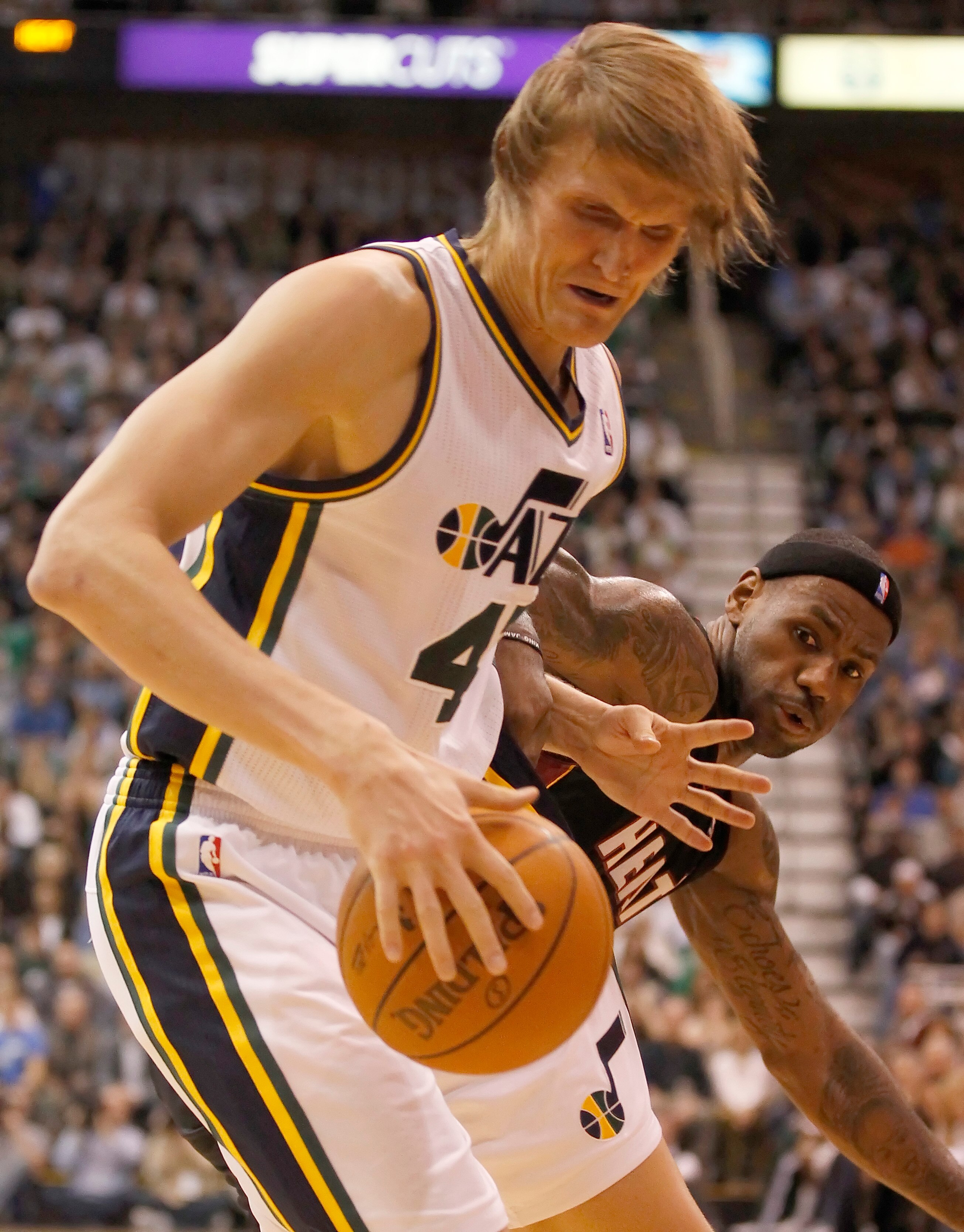 SALT LAKE CITY, UT - DECEMBER 8:  Andrei Kirilenko #47 of the Utah Jazz has the ball knocked away by LeBron James #6 of the Miami Heat during the second half of an NBA game December 8, 2010 at Energy Solutions Arena in Salt Lake City, Utah. The Heat beat 